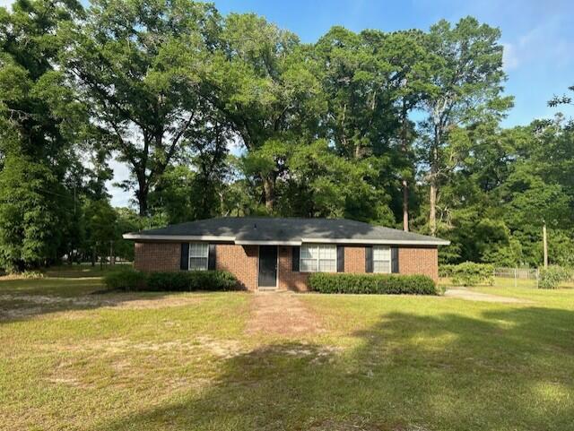 Welcome to the country, yet located just off of I-10 with convenient access to Pensacola, Crestiew and surrounding areas.  This home is on a corner lot & has been completely upgaded featuring new vinyl plank flooring, stainless appliances, ceiling fans, toilets,refurnished cabinets in the kitchen & bathroom, & freshly painted throughout.  Stepping outside you will find plenty of space for your outdoor gatherings or yard games.  The fenced back yard includes a shop with electricity, work bench & plenty of storage. Applications are online at rentcafe.com