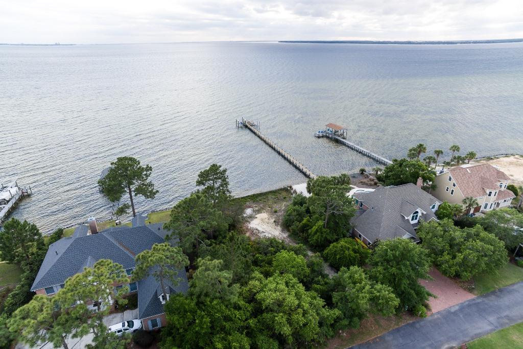 One of the last waterfront lots available in Bluewater Bay! This is your chance to build your dream home in the gated community of Southwind of Bluewater Bay. This lot at the end of a quiet street offers panoramic sunset views over the bay that are spectacular. There is already a seawall in place and a dock can easily be built. Dont miss out on your chance to build your waterfront home in Bluewater Bay.