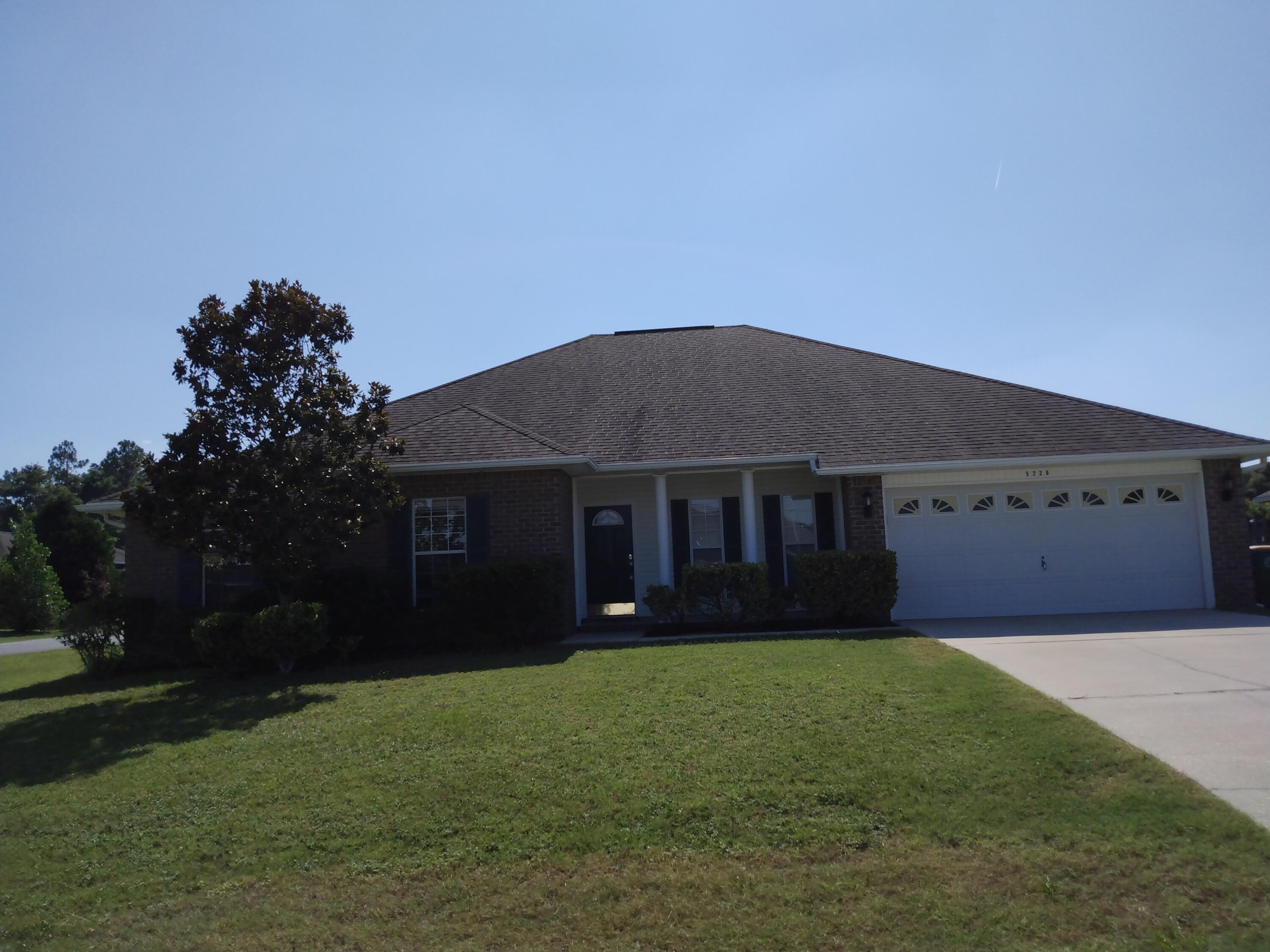 WOW!! Here's a 5BR/3B, 2792sf, corner lot, all brick home with a bonus room upstairs (24x20)!! A great mother-in-law/guest/teenager bedroom with its own bath -- just off family room!! The family room has 9 ft ceilings & crown along with formal dining room. Laminate flooring in formal dining room. Tile in all baths, kitchen & breakfast room, laundry & tile splash back in kitchen. Kitchen is fully equipped with stove, dishwasher, microwave & side-by-side refrigerator (all stainless steel)& pantry. Master bath has a double heirloom vanity & large walk-in shower and walk-in closet. The back yard is fully fenced with a side double gate off Lewis.