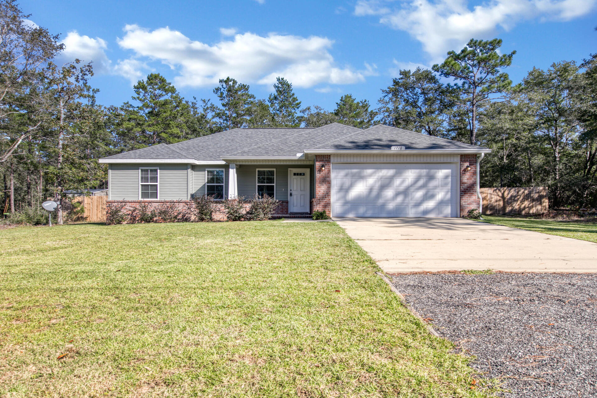 Welcome to this home nestled away in quiet Defuniak Springs. Just built in early 2019, the home boasts an open floor plan with an expansive fenced in back yard which rests on almost an acre of land. There is plenty of room to build a pool or convert the outdoors space to your private retreat. With a spacious master bedroom and en suite, this home offers an ideal split floor plan. Conveniently located just north of I-10 in Walton County, you can be at some of the World's Most Beautiful Beaches in under an hour. Away from the city lights, you can enjoy many a beautiful starry nights. Schedule your showing today as this home will not last.
CURRENTLY UNDER CONTRACT, SELLER ACCEPTING BACK-UP OFFERS!