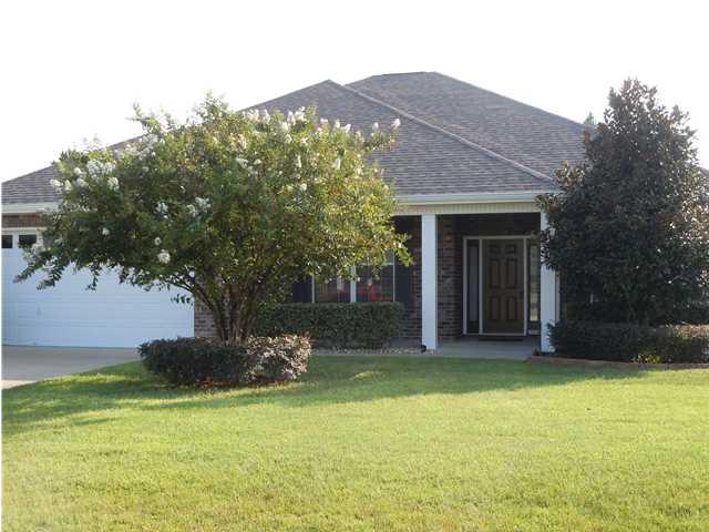 Beautiful rental home in south Crestview, conveniently located to military bases and other amenities. This home features a sparkling, in-ground pool, maintained at the owner's expense. Inside you'll enjoy the spacious, open floor plan and the extra space. Although it is labeled a 3 bedroom home, it has 2 bonus rooms and one could potentially be a 4th bedroom. There's also a corner fireplace, hardwood flooring in the master bedroom and one of the bonus rooms, double vanities & separate shower in the master bath, a pear tree in the front yard, storage building and more. This is a nice rental, so call to see it today.