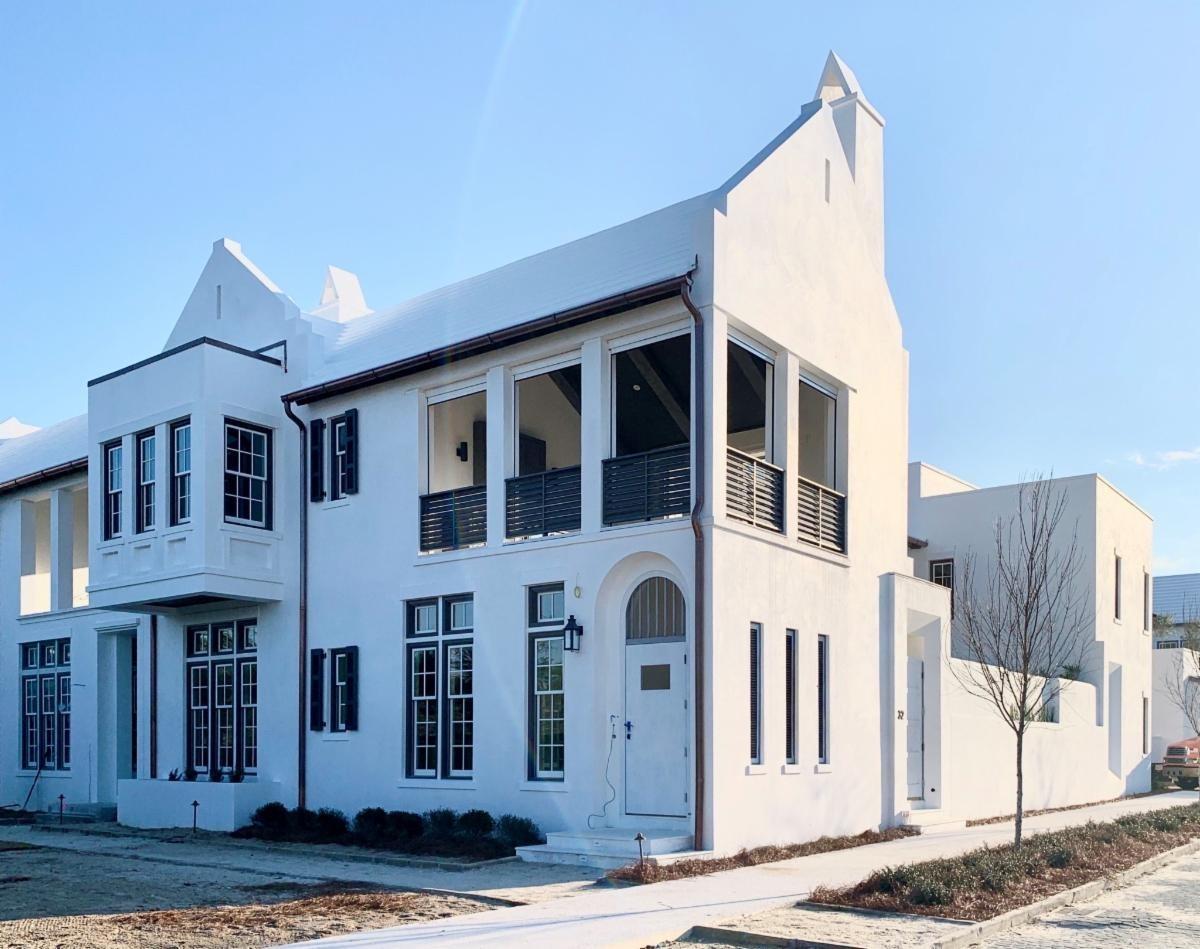 This corner home overlooks McGee Drive and Turtle Bale Spring & Pedestrian Path which leads to Turtle Bale Park and the majestic Gulf of Mexico. It is conveniently located close to Caliza Pool and the Zuma Wellness Center. The Christ & Associates design elegantly boasts an open floor plan across 3,813 square feet focusing on the views of the private courtyard, covered loggia, and pool.
The first-floor master bedroom opens to the courtyard with close access to the two-car garage. The well-thought out second-floor introduces a generous master suite, two guest bedrooms with en suite bathrooms, and a stunning second floor terrace which provides a summer kitchen & fireplace for entertaining. This is the perfect home for full-time or second home living.