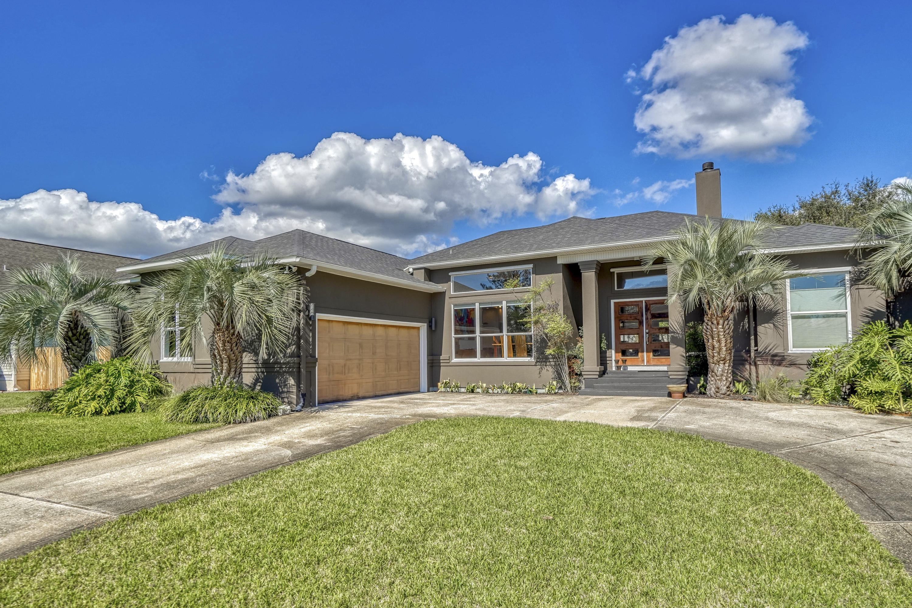 SEE THE WOW in this Impressive, One-of-a-Kind, Meticulously Maintained, Soundside 3 Bed/2 Bath, 2462 Sq Ft Home with Contemporary Architecture & Design, a Wrap-Around Driveway, Oversized Garage, In-Ground Gunite Pool, Outdoor Shower, Central Vacuum System, Foam Insulation, and Generator Connectivity, Located Just 500 feet from the Majestic Santa Rosa Sound. Completely Remodeled Down to the Studs within the Past 2 Years, with Over $200K in Updates to the Interior, Exterior and Landscaping. Exterior was Resurfaced/Painted w/High Quality Elastomer Stucco Paint, New Roof in 2017 with 40 Year Architectural Shingles, Newer Top End Appliances, Fixtures, Flooring, Doors, Windows and More! This Home Screams Curb Appeal and has a Grand Entry with Custom French Doors. As you Enter, you'll Find... an Open and Warm Floor Plan with Bamboo Hardwood Floors, Soaring Ceilings and Modern Architecture, Outfitted with Lighting Upgrades Galore, a Cozy Dual Sided Fireplace, and Tons of Natural Light Flowing In. The Kitchen is Gorgeous & Open, with Extensive Space to Maneuver and Host, Equipped with a Gigantic Calcutta Marble Countertop Island, Tiled Back-Splash, Custom Cherry Wood Cabinets, Upgraded Appliances, Open Dining Space, Pantry, and Spacious Breakfast Nook, with Bay Windows overlooking the Back Yard, Pool, Lush Landscaping, and Raised Built-In Garden that Stretches the Length of the Back Yard. 

Enter the Grand Master Bedroom, with Transom Windows for Additional Natural Lighting and an En-Suite Room attached that can be used for a reading room, office, sitting area, baby room, etc... It's a Huge Bonus that Stands Apart from typical Masters, that also Provides Private Access to the Covered Patio & Pool. Cozy up to the Fireplace Located on the Left as you Step in through the French Doors and the Open Feel with High Ceilings & Warm Accent Lighting.  Step into the Master Bathroom, Masterfully Designed and Outfitted with Up-End Fixtures, Granite Counters, Dual Vanities, a Modern Ceiling Fan, Gorgeous Tiled Flooring, and an Oversized Jetted Tub.  Additionally, you'll Find a Large Tiled Walk-in Shower with Custom Cobblestone Flooring. All this Providing the Ultimate in Relaxation that Gives an Inviting Spa-Like Experience. You'll Never Want to Leave!   

The Second & Third Bedroom have Generous Amounts of Space, and the Northwest Bedroom comes with an En-Suite Room just like the Master, which overlooks the Pool and Lush Back Yard.  The Second Bathroom is also Roomy and Inviting, with Tiled Flooring, Granite Counters, and First-Class Fixtures similar to the Master Bath, and it also Provides Access as a Pool Bath.  

There's So Much this Home offers that puts it a Cut Above the Rest, from the Architectural Design that is both Visually Stunning and Structurally Hardened for Lastability & Durability, to all of the Beautiful and Inviting Features that Make it a Wonderful Place to Call Home. There's Every Touch of Modern, Comfort, and Convenience Inside. The Home is Located under 10 minutes to Hurlburt Field/Ft Walton Area, Steps from the Santa Rosa Sound Beach and Community Beach Area, Minutes from Navarre Beach's Emerald Green Waters and White Sandy Beaches, and there's Nearby Shopping for Groceries and Eating. There's too Many Features to List here, Make your Appointment to See this Home and Everything it has to Offer in Person Today!
