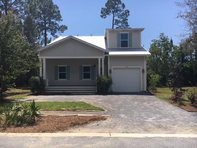Gorgeous spacious home located in Hidden Grove Subdivision. A private gated community located in one of South Walton's best centralized locations. Home is appointed with granite counter tops throughout, hardwood floors in the living,dining and kitchen areas, carpeted in four bedrooms and private loft area. Master bath and other two bathrooms have tile floors and granite counters. Homes are selling fast in this highly desirable subdivision. Close to beaches, restaurants and shopping.