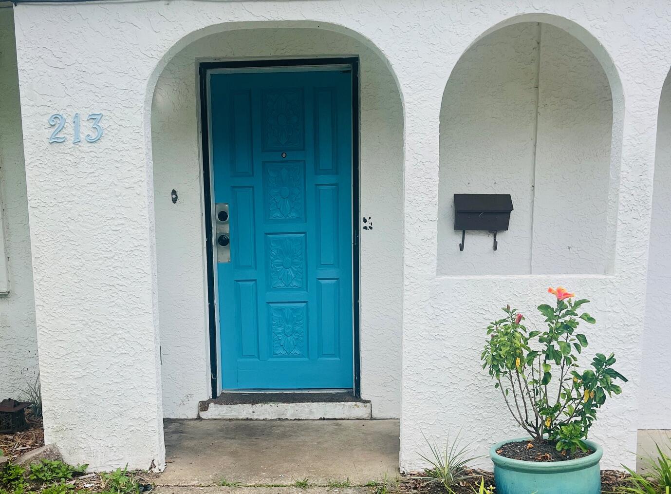 Welcome to this 3/BR, 1-bath cottage full of personality and tucked into a peaceful setting.  Has a converted garage for a 2nd living area.  Enjoy your morning or evening coffee in the enclosed Florida room or the covered back deck listening to the bird sing.   The backyard feels like your own private escape and is perfect for weekend barbecues, gardening, or entertaining. fruit trees and a grapevine add beauty and seasonal bounty.  A  shop with power can be used as a man cave, workshop, or storage.  Got chickens?  We got you covered!  Chicken coop included!  Collect your fresh eggs in the morning and unwind under the trees in the afternoon. This home offers a sweet slice of laid-back living. 4-Point inspection included.  Seller also has a survey from 2021.  Roof replaced in 2021, 3-ton HVAC and and main truck duct work done in 6/24, HWH replaced in 2023 and connectors and main pipes refitted in 2025, all electrical was replaced in 2021,  Plumbing partially re-piped in the last 5 years (fixtures and supply stop/lines).  In ground sprinkler system included.  Whole home generator also included (not currently working, may just need servicing.