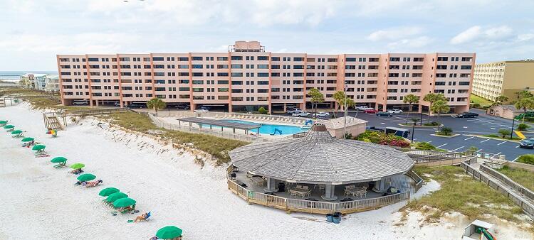 Great Location on the Beach! One Bedroom Large Condo with an open concept floor plan which is larger than the standard 1 Bedroom. Only 12 1-bedroom large units in Jetty East. A/C 3 years old, New Refrigerator, Corian Countertop, Great for entertaining with an expansive living and dining area, extra-large balcony with views of the Gulf, East Pass and Lake Christina.  Enjoy fireworks over the East Pass in the summer. Easy access to the middle staircase and down to the beach, with no waiting for the elevator! Great as residence or vacation rental. 2021 income $29000 with 118 days of owner usage. The unit features EFCO (category4) sliding glass doors and windows paid by the seller.  Begin and end each day enjoying spectacular morning views of the fishing boats in the East Pass, Gulf of Mexico and the most breathtaking evening sunsets and seasonal fireworks. Great location to shopping, grocery store and restaurants. Jetty East Amenities: 2400 sq. ft. pool with sun deck, hot tub, beach side pavilion with charcoal grills, tennis courts, pickleball, fitness room, kid's activities, music entertainment, shuffleboard, owners meeting room and of course 800 feet of Sugar White Sand!  Jetty East is gated with 24 Hour Security. Call for details. Come Buy Today!   Jetty East is a NON-WARRANTABLE Condo    No conventional financing