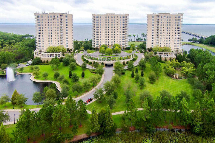 PRIVACY and UNOBSTRUCTED VIEWS! This 3220 sq.ft. Castleton condo has 180 degree unobstructed views of the Bay, golf course and Gulf. The huge curved balcony off of the living, dining and kitchen areas affords unparalleled PRIVATE yet stunning views and beautiful sunsets.This home, with the most favored floor plan offers peace and quiet in the most desired west building and features Viking Professional appliances, granite in the kitchen and bath rooms, crown molding, trayed ceilings, great room fireplace, laundry room, summer kitchen and private elevator entrance. There is a climate controlled storage room and two assigned garage parking spaces. OWP has a state of the art fitness center, pool, outdoor spa, indoor spa, sauna, steam and hobby rooms. For additional amenity details click MORE There are numerous entertaining area throughout the 3 buildings including billards and table tennis room. There are wonderful water gardens, a putting green, bocce ball courts, dog park, garden plots and a potting room for owners who want to exercise their "green thumbs". Can you believe there is even a car wash!