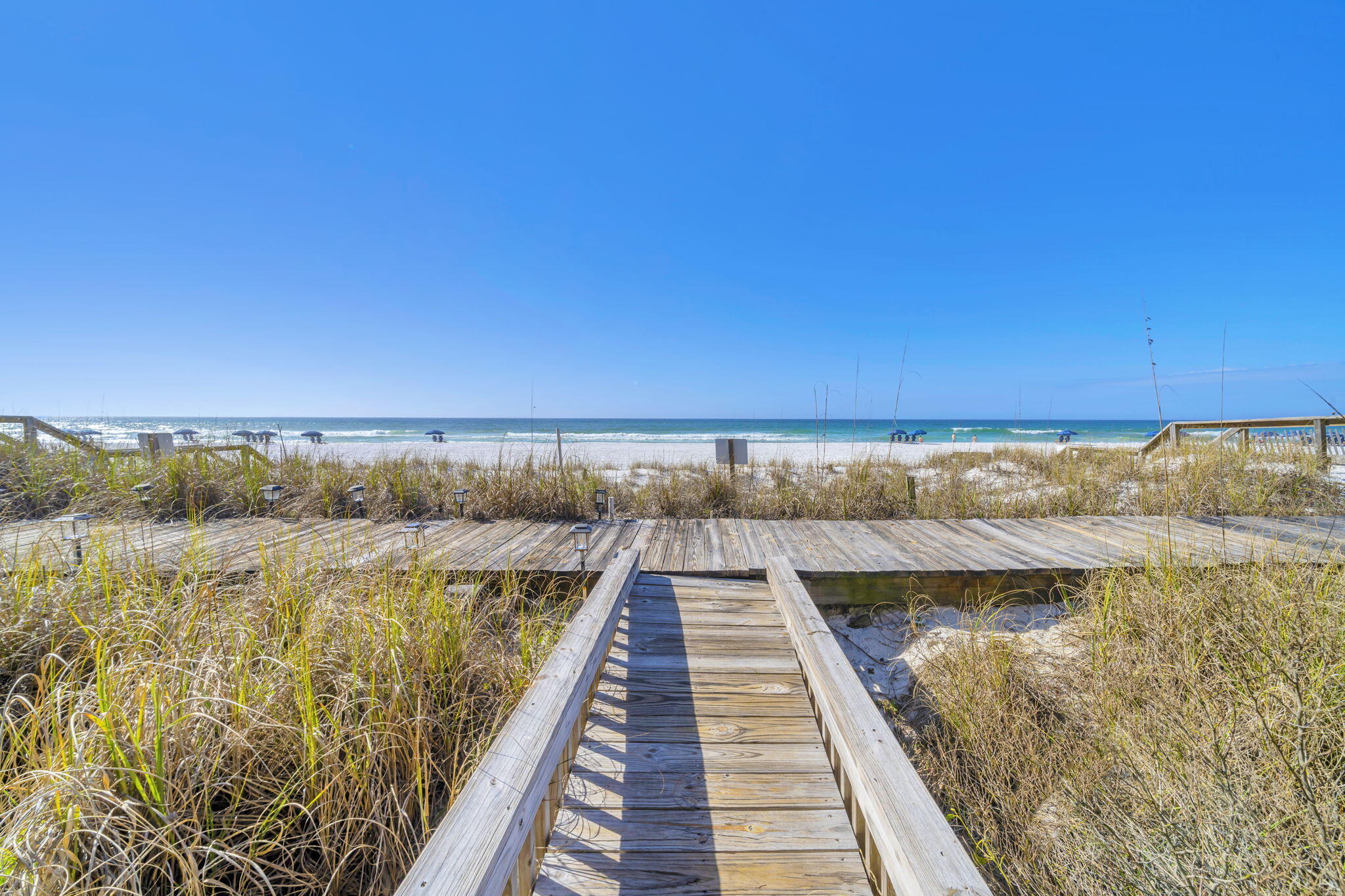 Postcard-Perfect Views | Rare Gulf-Front Offering in Miramar Beach

Introducing an exceptionally rare opportunity to own a true Gulf-front townhome directly on the sugar-white sands of Miramar Beach. Located within the intimate Costa del Sol community, this remarkable residence offers what few properties can -- step-off-the-deck access to the beach and unobstructed panoramic views of the emerald Gulf from every level.

This is beachfront living in its purest form. Step from your private deck onto powder-soft sand, and within moments, you are standing at the water's edge. No roads to cross. No boardwalks. Just seamless coastal luxury. Read more... Property Highlights

3 Bedrooms | 3.5 Bathrooms | Sleeps 12 | Multiple Gulf-Front Balconies

Spanning three thoughtfully designed levels, this updated townhome blends refined comfort with breathtaking natural beauty.

Main Living Level (Second Floor Entry)

The primary living space features an open-concept design where the living room, dining area, and kitchen are all oriented toward sweeping Gulf views. Expansive glass doors invite natural light and open to a spacious beachfront balcony -- an ideal setting for entertaining or enjoying the rhythmic sound of the waves.

Upper Level - Private Retreats

Upstairs, two generously sized bedrooms each offer comfort and privacy.

The primary suite is a true sanctuary, featuring a king bed, stunning beach views, and a private Gulf-front balcony perfectly positioned for both sunrise reflections and dramatic sunset skies. The guest bedroom includes a queen bed and twin bunks, comfortably accommodating family and visitors.

Ground-Level Lockout Suite

The first floor offers a fully self-contained suite with its own private exterior entrance -- ideal for guests or enhanced rental flexibility. This level includes an open living area, kitchen and dining space, spacious bedroom with queen bed, sleeper sofa, twin-over-twin bunks, and a private bath. The lockout design provides privacy and versatility, making this property especially attractive as an income-producing investment.

Unmatched Location

Situated in Costa del Sol along Scenic Gulf Drive, this residence places you directly on the shoreline while remaining close to premier dining, shopping, and recreation.

Enjoy beachfront strolls to local favorites such as Pompano Joe's and The Whale's Tail Beach Bar & Grill for fresh Gulf seafood and waterfront dining.

Upscale shopping and entertainment are just minutes away at Silver Sands Premium Outlets and Destin Commons.

For water enthusiasts, the nearby Dolphin Reef offers exceptional snorkeling and marine life experiences just offshore.

A Rare Investment Opportunity

True Gulf-front properties with direct sand access and unobstructed views from every floor are extraordinarily limited in supply. With the ability to accommodate up to 12 guests and a layout designed for both privacy and gathering, this property offers strong rental potential while delivering an unparalleled coastal lifestyle.

This is more than a beach home -- it is a legacy property defined by Postcard-Perfect Views and timeless Gulf-front luxury.

Contact us today to schedule a private showing of this exceptional beachfront residence.