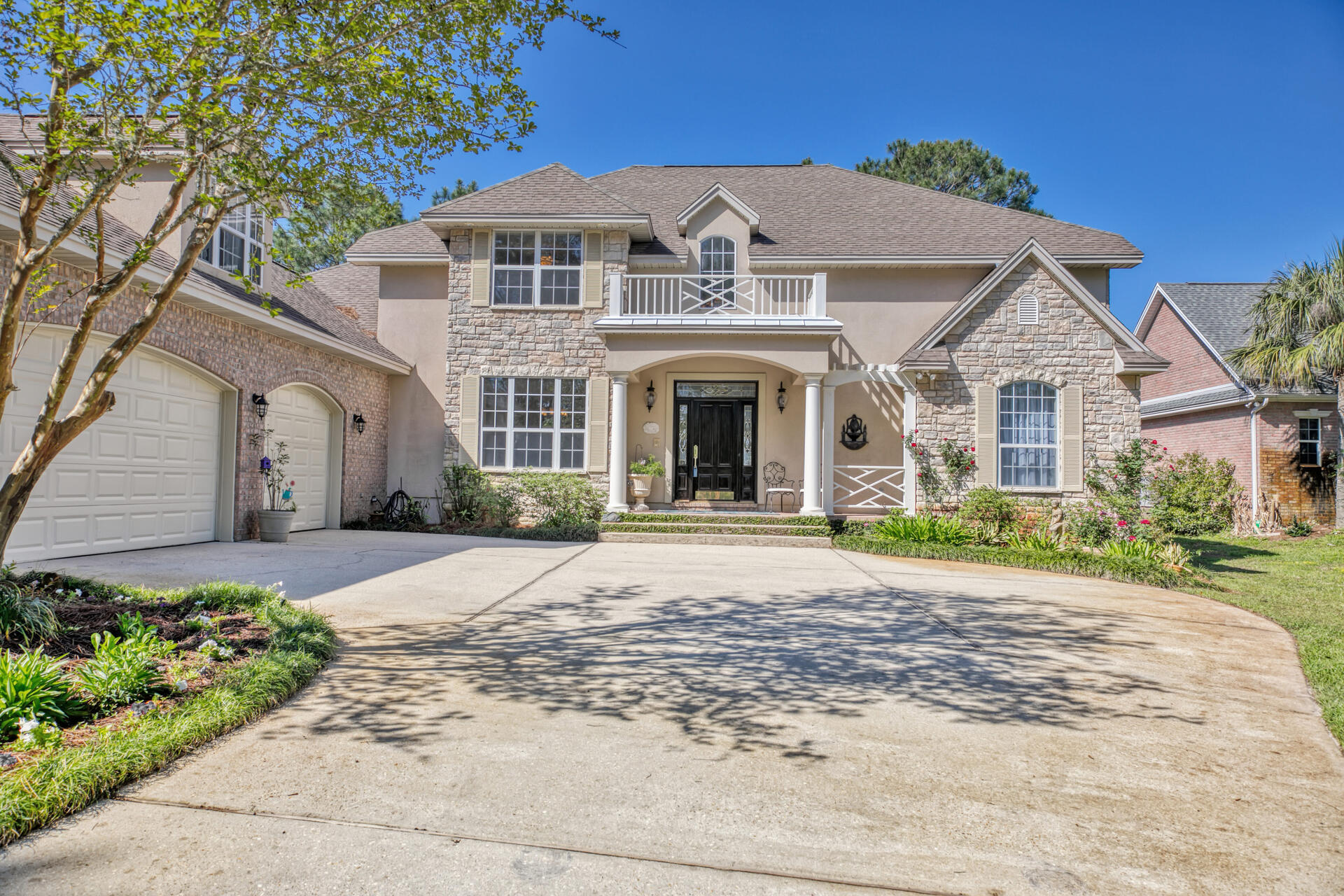 You'll never miss a sunset when you make this custom-built waterfront home with panoramic Choctawhatchee Bay views from almost every room your new home! Be sure to bring your boat as this property has a Private 125'+ dock  (owners kept their 27' Wellcraft boat there) with an upper deck - the perfect place to watch the July 4th fireworks from Boggy Bayou, Destin Commons, Sandestin, FWB & East Pass (weekly in summer). This property is located in the Raintree Estates Subdivision and has too many features to list so be sure to see the very detailed information in the MLS Documents.  The floorplan was strategically designed by the owner with extensive thought put into every detail. (Click More) There are large living, dining, and kitchen areas that are excellent for entertaining with direct access to the back porch and patio areas with space to comfortably seat 20+ guests.  The Master Bedroom & ensuite bathroom is located on the main level with double French doors leading to the back porch. The Master dressing area has his-and-her-closets, built-in cabinets & direct access to the adjacent laundry room. A grand hand-made curved staircase leads to the upper level loft which opens to a large balcony, 3 additional bedrooms and 2 bathrooms.  There is no shortage of storage in this home. The huge attic has a dormer window, reinforced floor over the garage, a built-in staircase as well as upstairs walk-in access from the loft. There are 3 additional storage areas upstairs, a large closet in the living room (which can also be used for shelter during bad weather), closet off the office with a utility sink and exterior access, and even a closet in the dining room to store your china.  The homeowner is an avid gardener so the landscaping is exquisite with over 100 varieties of hardy and hard-to-find UF-recommended plants that are well-suited and won't require pesticides. The garden attracts many birds, butterflies and hummingbirds. The blooming plants provide flowers almost year-round, including winter. Additional features include a Rinnai tankless hot water, security system, central vacuum, intercom, fireplace with gas lighter, lighted tray ceilings, fenced backyard with aluminum fencing, electrical outlets inside kitchen & bathroom cabinets, side porch with outdoor shower & utility closet, transferable termite bond w/Bryan Pest Control, Sentricon bait system, Irrigation well & pump with upgraded zoned system, and more. The dock was damaged during hurricane Sally and will be repaired prior to closing, or the buyer will be given a credit. The roof will also be replaced by the seller prior to closing.