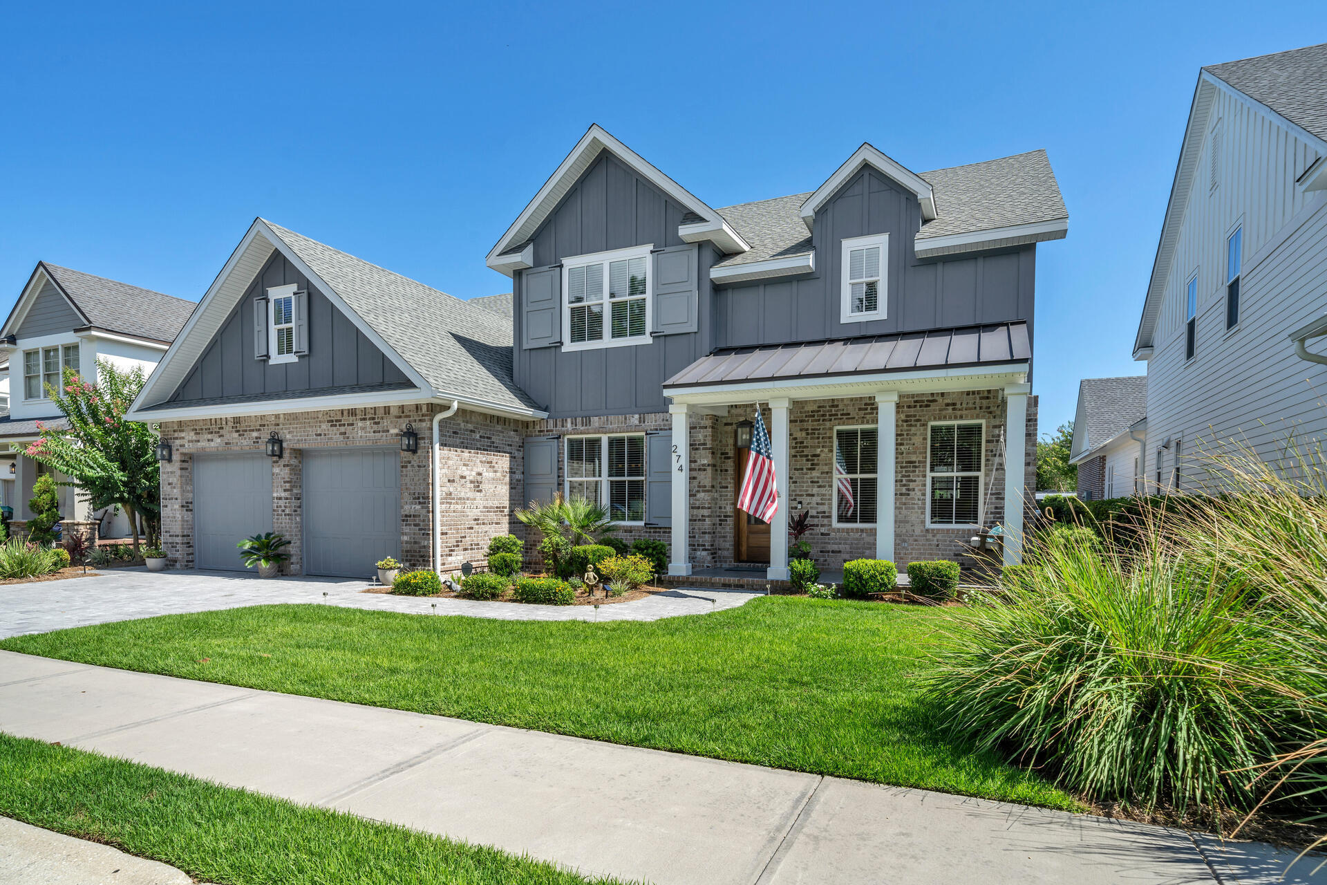 This spectacular 5-bedroom home is a must see. This is one of the newer homes in Kelly Plantation built in 2018. The spacious living area has French doors opening to the just completed incredible screened-in outdoor space including a 32x16 PeppleTec heated pool with waterfall feature, hot tub, summer kitchen and multiple seating & dining areas. The kitchen boasts custom cabinets, high end appliances including an Italian made Verona Gas Range and separate full-size Sub Zero refrigerator and freezer. Walk through the butler's pantry into the dining room. The master suite and a guest bedroom/office with bath are located on the first floor. Upstairs there are 3 additional bedrooms and 2 baths plus a workout area.  A separate stairway leads to an additional finished room above the garage. There is also a walk-in storage room upstairs. Upgrades are abundant throughout the home and include wood floors, custom closets, custom window treatments, built-in bookcases, Toto washlet in master bath, home security system with Nest doorbell cam, 2 HVAC units and a Rinnai hot water system. Outside the spacious screened outdoor space is an additional 60 x 15 backyard.  Situated just a very short stroll away are wonderful amenities which include a community pool, tennis courts, fitness center, and children's playground. The famous Kelly Plantation golf course is second to none and boasts a restaurant and an owner's club.