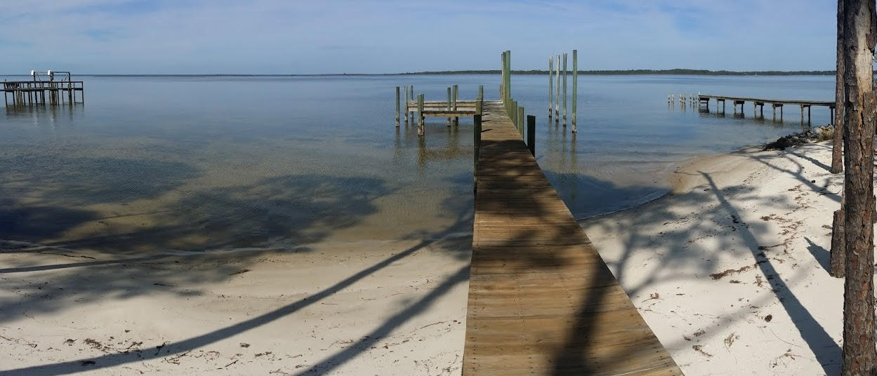 Absolutely gorgeous water views of the Choctawhatchee Bay and the Bayou await you when you build your dream home on this 119-ft white,sandy beach bayfront lot. Dock and boat slip already in place. Located in tranquil Woodland Bayou Estates at -3/4 of an acre you can build almost any house plan you desire. Click on the aerial in-flight overview to fully appreciate the lot's proximity, size, and beautiful surroundings. Woodland Bayou Estates is located near the west end of 30A and less than 10 minutes from the Grand Boulevard shopping, dining and entertainment venues. With so few waterfront lots left, you will want to see this one to fully appreciate it!