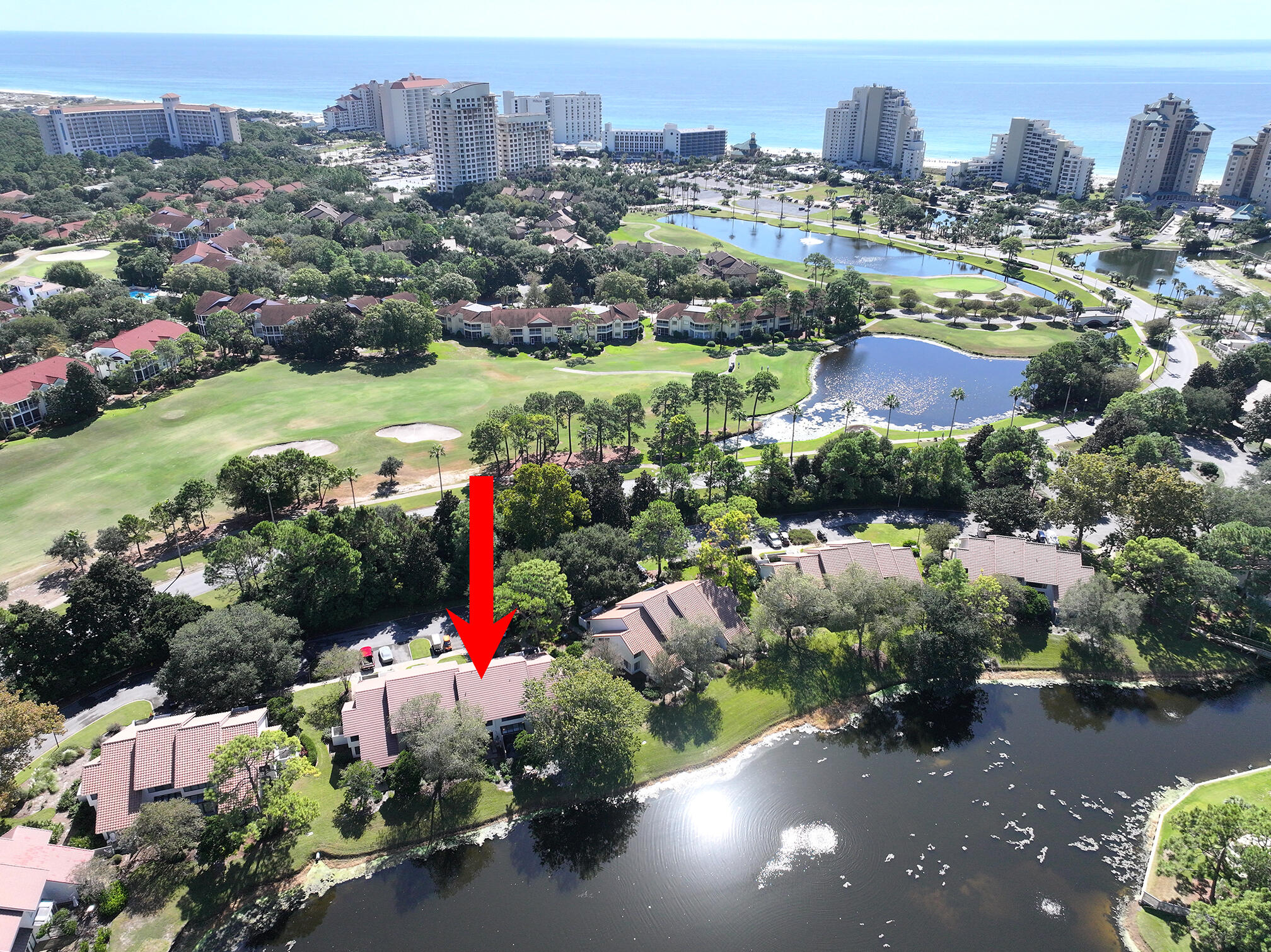 This beautiful Beachwalk Villa is being sold fully furnished and includes its own golf cart! Exceptionally well-located on the Gulf side of Sandestin, this turn-key villa features two bedrooms with two and a half bathrooms and is located a block from the beach access area.  The property offers wonderful views of Horseshoe Lake and has been updated with stainless steel appliances. A new roof was completed in May 2025, alongside renovations to the magnificent ceiling window and window wall alcove adjacent to the entry. This dining room feature provides a solarium-style feel, filling the villa with natural light. Whether it's playing and relaxing on the beach, boarding a dinner cruise or enjoying a shopping excursion, it's all here for you within the Resort. So don't wait, come see it today!