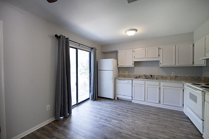 Newly renovated interior! Just minutes away from Eglin AFB, this townhome is centrally located in the heart of Niceville. Whole home has just been painted, and granite counters have just been installed. The kitchen is a great space with white appliances, wood flooring, and gorgeous granite counters. The downstairs is wood flooring throughout and both bedrooms feature ceiling fans. The master bedroom has an ENORMOUS closet. The additional bedroom has two large size closets as well. The bathroom boasts new light fixture and mirror and new vanity. Bonus features are indoor laundry room, deck, ample parking and spacious yard. This property is move in ready and won't last long. Property exterior is in the process of renovation.