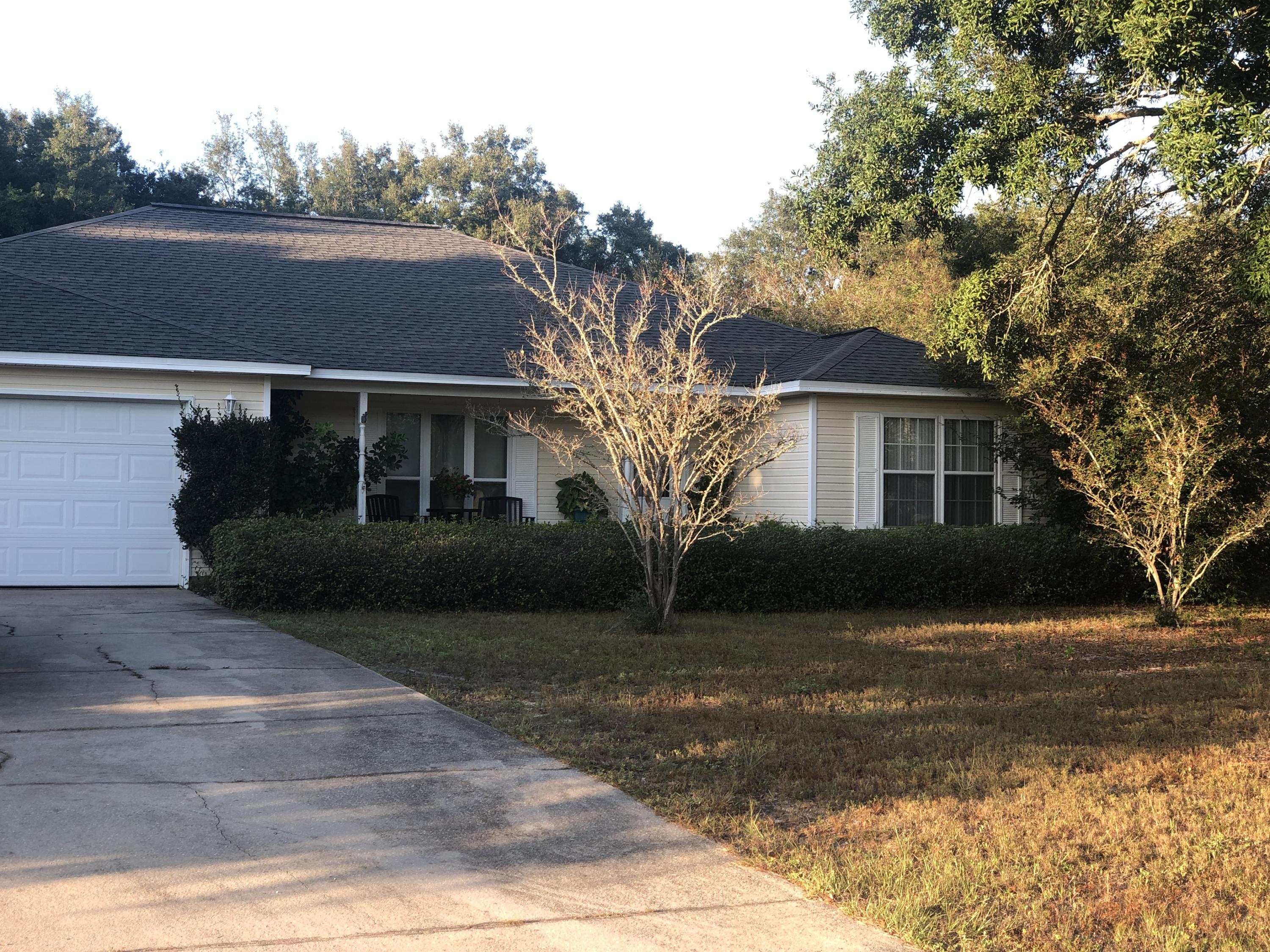This home is located in a dog walking, bike riding, friendly neighborhood! It's conveniently located to stores and schools. Walk past a welcoming sitting porch as you approach the leaded glass front door. Walk across engineered bamboo flooring as you enter and gaze at elevated plant shelves and built in display shelving. Designer paint colors add to the charm and beauty of this lovely home. Built in 2001, this home has vaulted ceilings, and tapered ceilings which bring the feelings of openness and architectural excitement! Soak in the jetted tub after a hard days work, or whip up a spectacular meal on the GAS stove! The kitchen is nicely appointed with stainless steal appliances and an open counter allowing communication and interaction with family and guests in the living room. The master bath offers double sinks and double closets! For added enjoyment, the Florida room has been permitted and closed in to created indoor/outdoor seating. Enjoy the Florida room overlooking large mature trees and a fully fenced in yard. This home, has NEVER been smoked in and offers a well cared for and clean environment, even though two large dogs live here. Don't wait to view this property! It's a HOME run a deserving family.