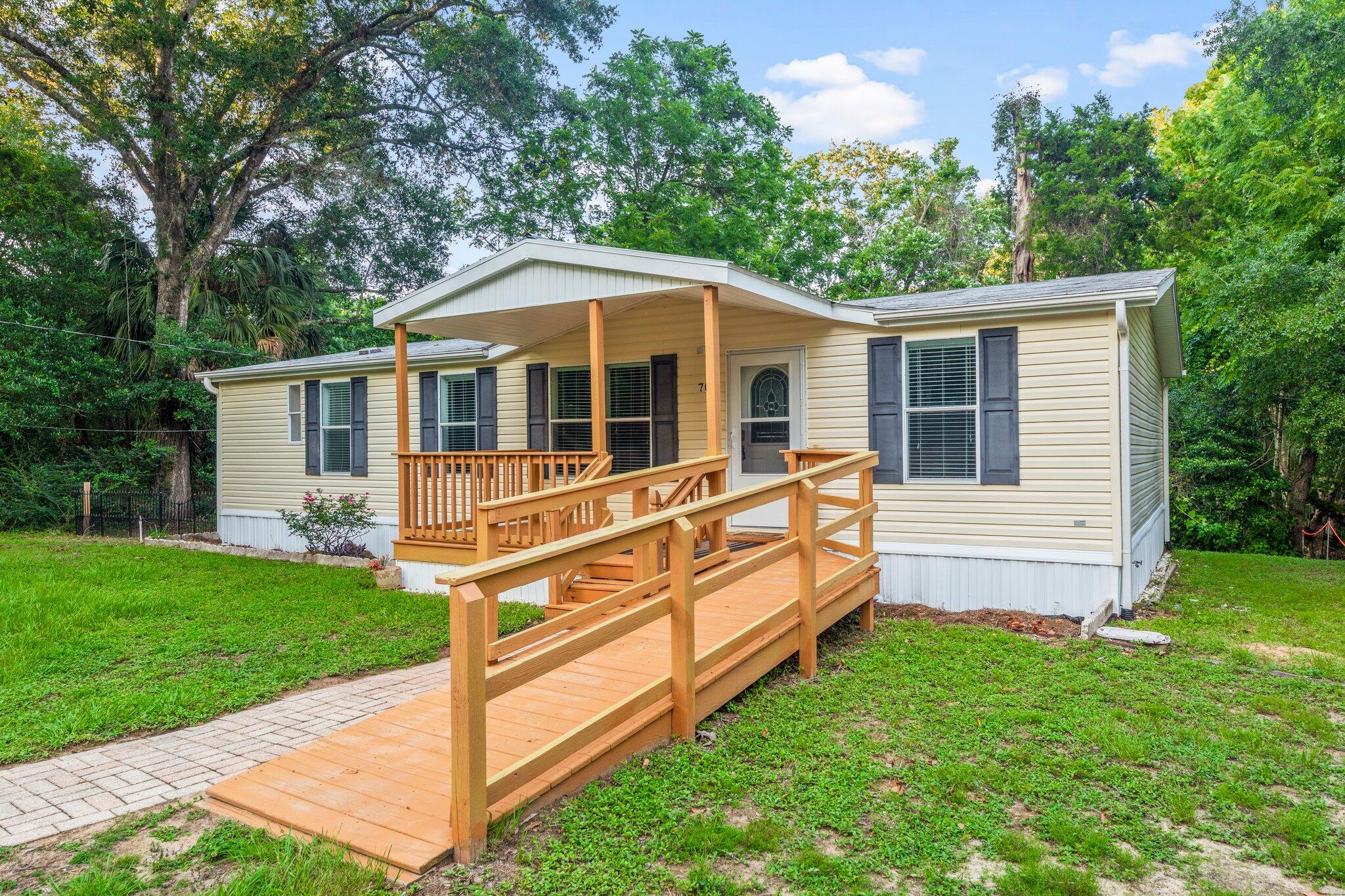 Lovely home surrounded by mature trees and an abundance of natural area. This home offers a peaceful retreat form the hustle and bustle of everyday life. Enjoy the open and bright living area with lots of natural light. The wrap around kitchen is spacious and includes tons of cabinet and counter space. Grand master suite includes an oversized garden tub, double vanities and separate walk in shower. Two guest bedrooms are spacious and offers views to the natural area. Ample parking round out this nice home. Owner will consider pets with restrictions. Any pet must be spayed/neutered, housebroken and current on all shots. Requires a non-refundable pet fee.  Tenants required to carry renter's liability insurance. Any person at lease 18 years old must apply separately.