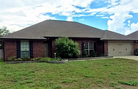 Come see this lovely 4BR/2BA home in Lee Farms Subdivision. This home opens up to an open floor plan with large family room, dining room, breakfast bar, well equipped kitchen with granite counters and stainless steel appliances, and breakfast nook. This home also has a split bedroom plan with the master bedroom having a walk in closet, master bath has double vanity, garden tub and an amazing walk in shower and the additional three bedrooms, full bath and laundry off the family room. Privacy fenced back yard with open patio, two car garage with opener and pet considered round out this fantastic home. Call today!