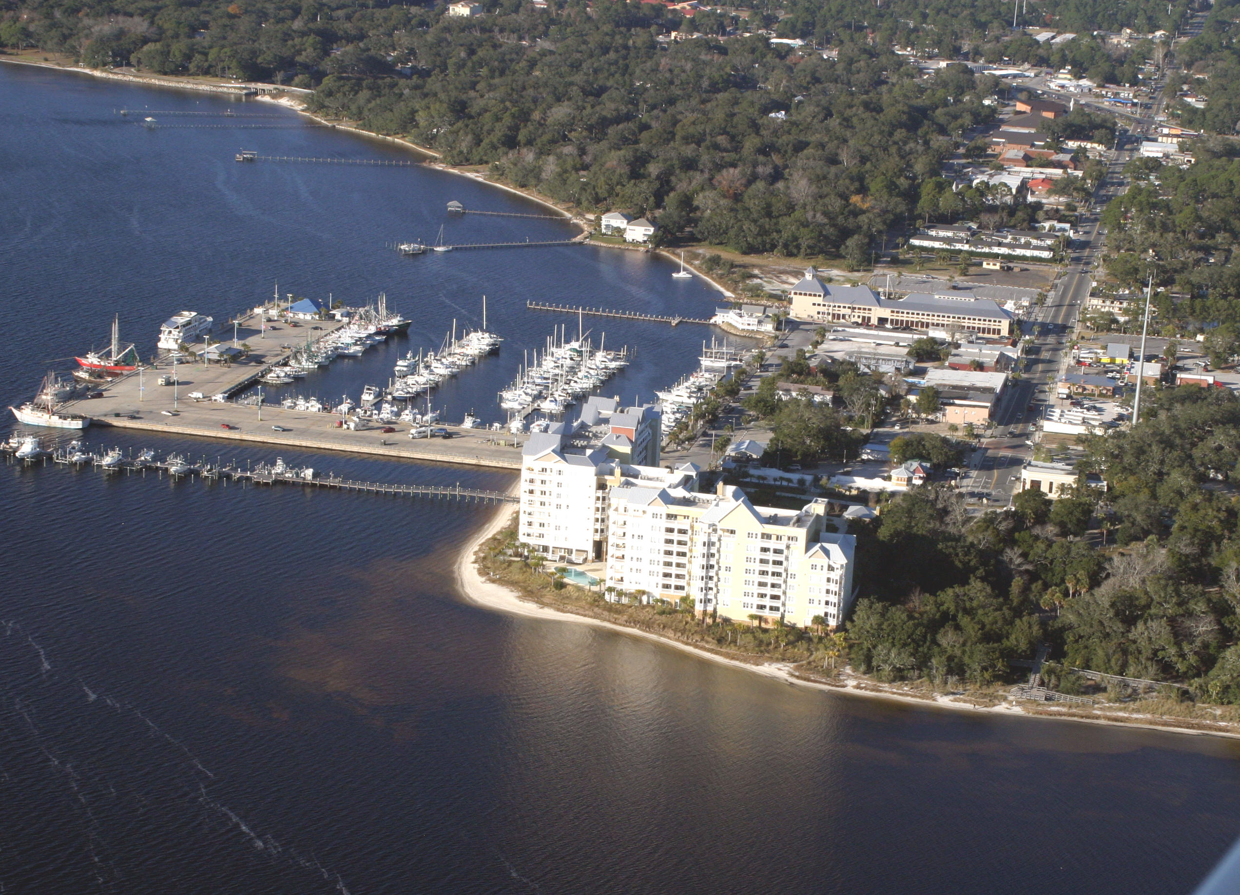 A 6th floor unit in Harbour Village is now available! This 2BR/2.5BA unit faces south so you have a terrific view of the Bay out to the pass. The unit and the entire complex underwent renovations thanks to Mother Nature. The renovations to this unit are complete and are nearly completed for the rest of the building, and the scaffolding has been removed. The kitchen boasts granite countertops, and a reverse osmosis water filtration system. The private balcony can be accessed through the living area and the master suite. Harbour Village is a gated community with covered parking garage, private dock, fitness center, pool, community room and you're walking distance to all the boutiques and restaurants in historic St. Andrews and you'd have a front row seat to all the year-round events. All info is approx and must be verified by Buyers if important.