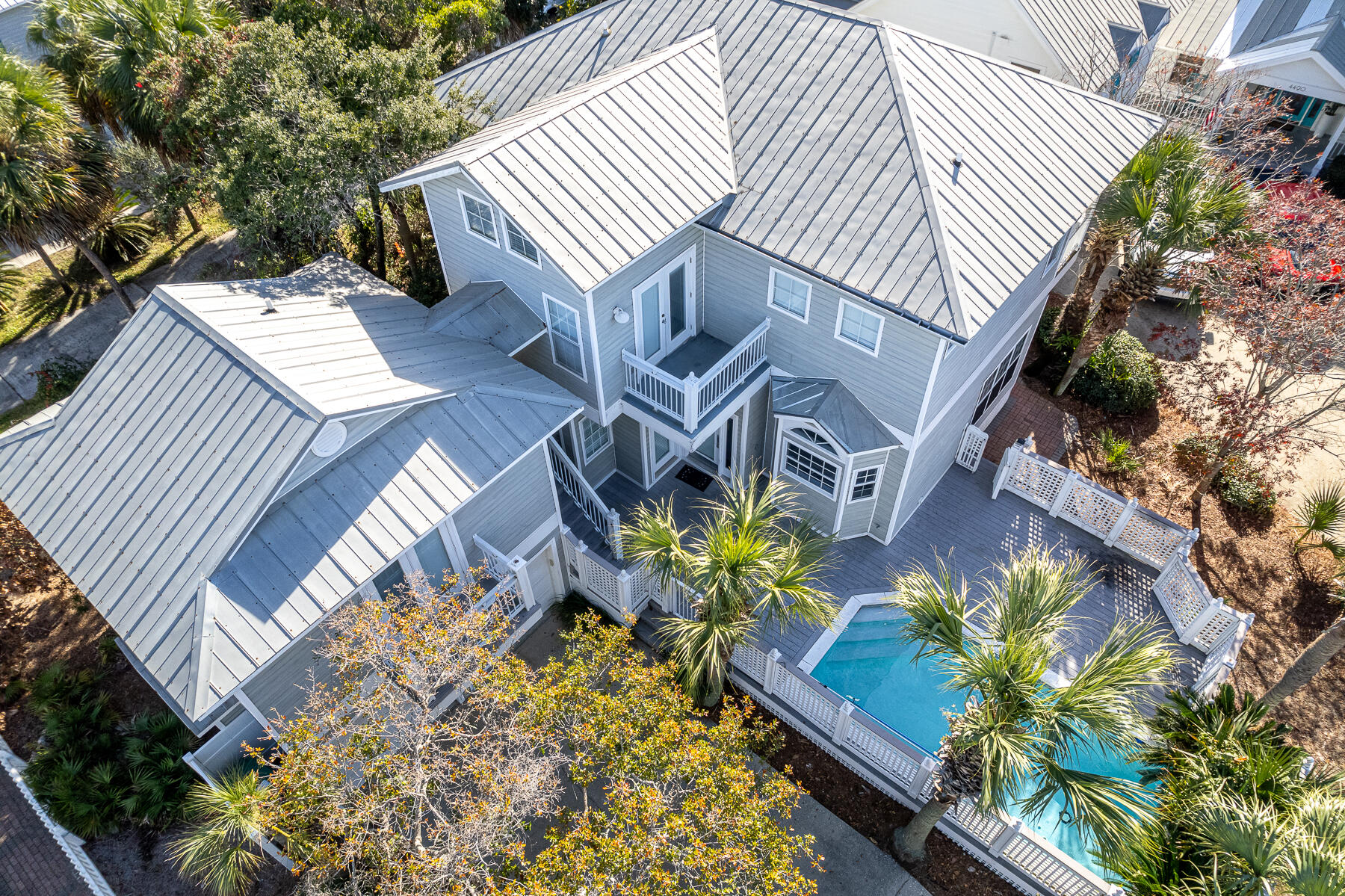 This property is currently under contract with an inspection contingency and a 72 hour kick-out clause. Discover the allure of coastal living in this home, conveniently located within close proximity to the beach. With 5 generously sized bedrooms & 5 well-designed bathrooms, this residence is perfectly suited for a primary, secondary, or investment property. The first floor welcomes you with an open living room. Overlooking the private heated pool, the dining area & fully equipped kitchen provide both functionality & aesthetic appeal. The master bedroom suite, situated on the first floor, opens onto a private patio, offering a serene retreat. The master bathroom indulges with a whirlpool tub and a walk-in shower. Venturing to the second floor,  you'll find additional living space, along with 3 additional bedrooms. Above the private two-car garage, a carriage house awaits, complete with a living room, a kitchenette, and a bedroom.

Crystal Shores amenities, including access to the community pool, add to the appeal of this property. Positioned as a wise investment, the home's prime location and desirable features ensure enduring value and a solid return. Enjoy close proximity to delightful restaurants, excellent shopping centers, championship golf courses, and a short walk to the sugar-white shoreline of the Gulf of Mexico. Seize the opportunity to own this charming home, perfectly nestled in one of Florida's sought-after areas.