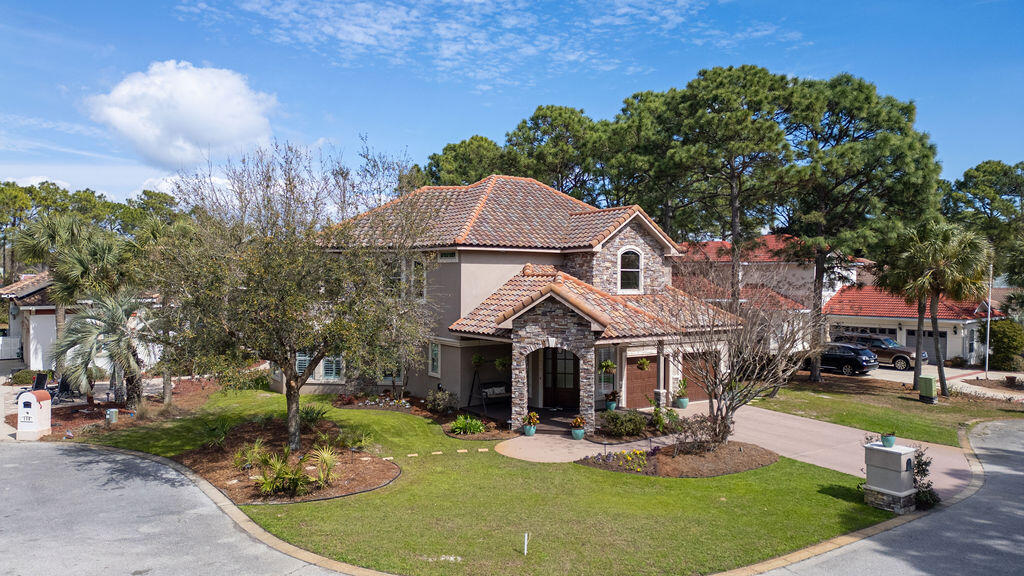 This is the One!!  The one that was built by a renowned builder for he and his family.... the one that has so many sought after finishes, and thoughtful details throughout ... the one that has an incredible sunroom and outside Florida terrace, the one that has an awesome entrance with gorgeous landscaping awaiting your arrival, and the one with all furniture and appliances conveying.  Yes.. consider it turnkey and carefree with the meticulous care the current owners have continually given this property. Click on the photos/video and discover all the upgraded features this Craftsman Style home has to offer. Located in the beautiful, gated golf course community of Emerald Bay with low HOA fees and a plethora of amenities. Come see it today, make it yours, and  love it  forever.