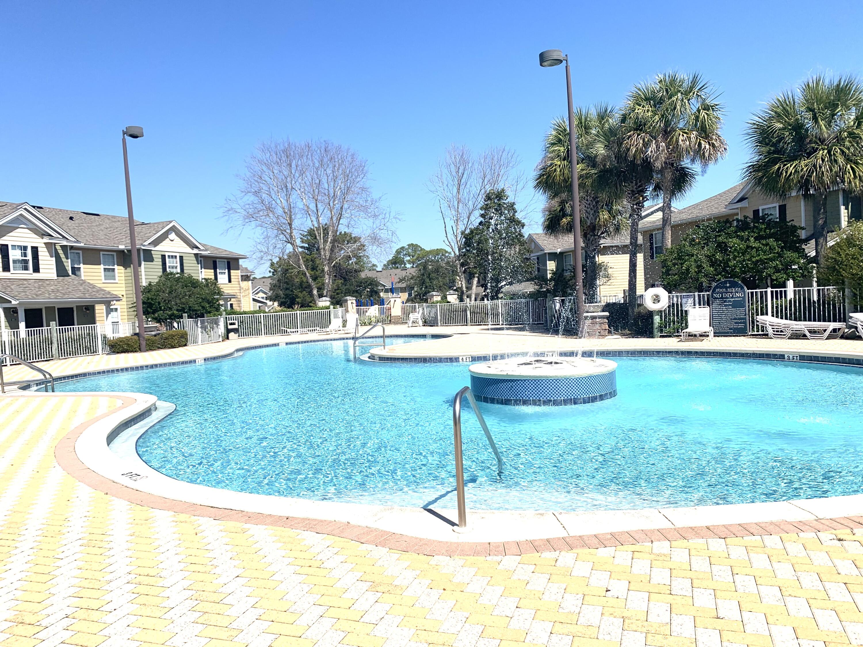More pictures coming soon. Spacious 4 bedroom 3 full bath, second floor unit. Sold furnished-some and with all appliances. Ceramic tile and granite countertops. Nautilus Cove offers several amenities including a large resort style pool, fitness center, club house with full kitchen, children's playground, and walking stations. Located in the heart of Panama City Beach you are close distance to the beautiful Emerald waters of the Gulf, and less than 2 miles from Pier Park where you will find great restaurants, entertainment and shopping. Come see for yourself all that Nautilus Cove has to offer. All measurements and information to be verified by buyer.