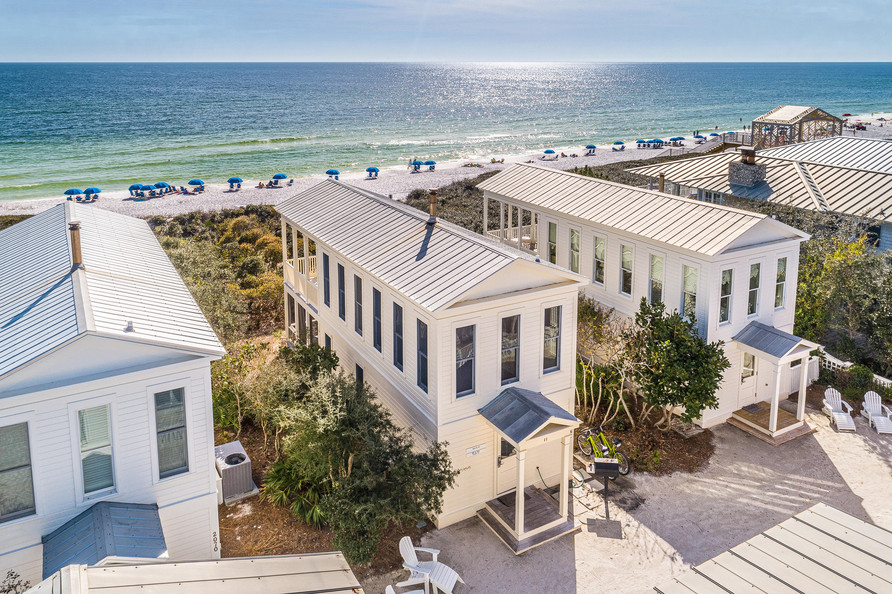This cottage is a finely crafted bungalow directly on the gulf on Seaside's western side of town. The cottage is perfection without pretension. Simplicity is its essence. Largest honeymoon plan lovingly restored. The first floor is devoted to a spacious bath with a tiled shower and a king bedroom with custom made cabinets made with heart of pine. The bedroom opens onto a private screened porch. Billowing curtains grant privacy for the generous porch with outdoor tub. The stairway winds its way up to the second floor where the living room takes full advantage of the fabulous gulf views. Sunlight cascades into the cottage, constantly changing the mood of the room. At high noon a turquoise gulf shimmers, while later in the day, as the sun dips towards the horizon, waves glisten with the sunset over the sugar white sand and sea. The covered porch with hammock is the perfect place to take in the amazing views of the gulf from east to west. During cool winter evenings the wood burning stove will create a pleasant ambiance. The kitchen has been renovated with all modern appliances and custom heart of pine cabinetry with a contemporary flair. The great room with beamed ceilings, white slipped covered furnishings and nautical accessories create an inviting beach cottage by the sea. The cottage is maintained yearly with fresh paint. Updates include king bed, window treatments, HVAC, water heater and washer/dryer. Additional photos will be added soon.