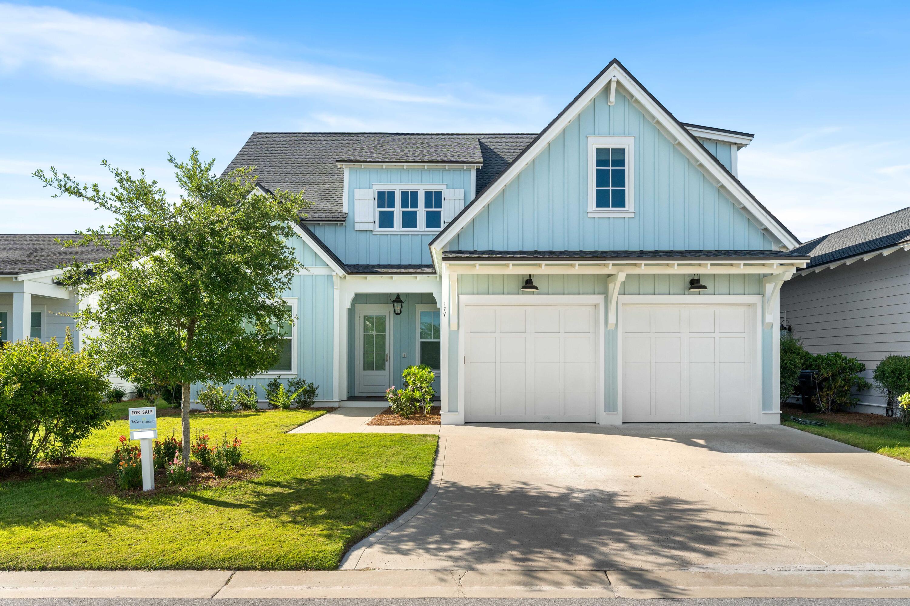 JUST REDUCED BY 46K! Best per square foot price! Nestled in a serene setting, this stunning 5-bedroom, 4.5-bathroom home offers 3,087 sq ft of thoughtfully designed living space, with an additional 420 sq ft of screened outdoor living space. Situated on a larger lot that backs to lush green space, this property combines luxury with privacy and style. A living room designed for entertaining with custom reclaimed wood mantle, cozy gas fireplace, and glass sliding nano doors that seamlessly connect the indoors to the screened porch. Features: crown molding, 22ft ceiling in the foyer, 10ft ceilings throughout the rest of the home, hardwood floors throughout, designer lighting, and custom window treatments. The chef's kitchen boasts top-of-the-line Thermador appliances, a Bosch refrigerator, Sharp microwave, a large quartz waterfall island, built-in bench seating with storage, and a pot filler for a gourmet's ease and style. Entering from the garage, the mudroom/laundry boasts custom built-ins, herringbone tile, and ample storage above the washer and dryer. The spacious main-level master suite opens to the porch via elegant French doors and features custom blackout curtains, a spa-like en-suite bathroom with a standalone tub, upgraded gold fixtures, and exquisite herringbone tile. A second bedroom on the main floor adds convenience and versatility. Upstairs you'll find two well appointed guest suites as well as an oversized fifth bedroom. The fully fenced backyard features a heated gunite saltwater pool with an 8-person spa, shell stone paver surround, and outdoor shower creating the ultimate backyard oasis. The pool is overlooked by an outdoor cabana that offers a gas fireplace, in-ceiling speakers, a fan, and TV connections, with the fireplace wrapped in a chic Tabby finish. A built-in summer kitchen within the screened-in porch with a gas BBQ grill, stainless steel drawers, and a mini fridge is perfect for alfresco dining.

Offering a lifestyle of both modern convenience and appreciation of the natural environment, the 1,400-acre WaterSound Origins community is located near all the highlights of South Walton including beaches, shopping, and dining. Amenities include the Village Commons with resort style swimming pool, an events lawn, fitness center, and sports courts plus parks, walking trails, and access to Lake Powell with complimentary kayaks for residents' use. Origins Golf Club is a six-hole regulation short course located within the community that also plays as a nine-hole executive course or a 10-hole, par-3 layout. The growing WaterSound Origins town center at the front of the neighborhood includes a Publix grocery store, multiple restaurants, and other services. Owners have the opportunity to join the WaterSound Club with multiple amenities to members including private beach access, beach services, swimming pools, dining, two private golf courses, and the brand-new Lifestyle Center at Camp Creek.