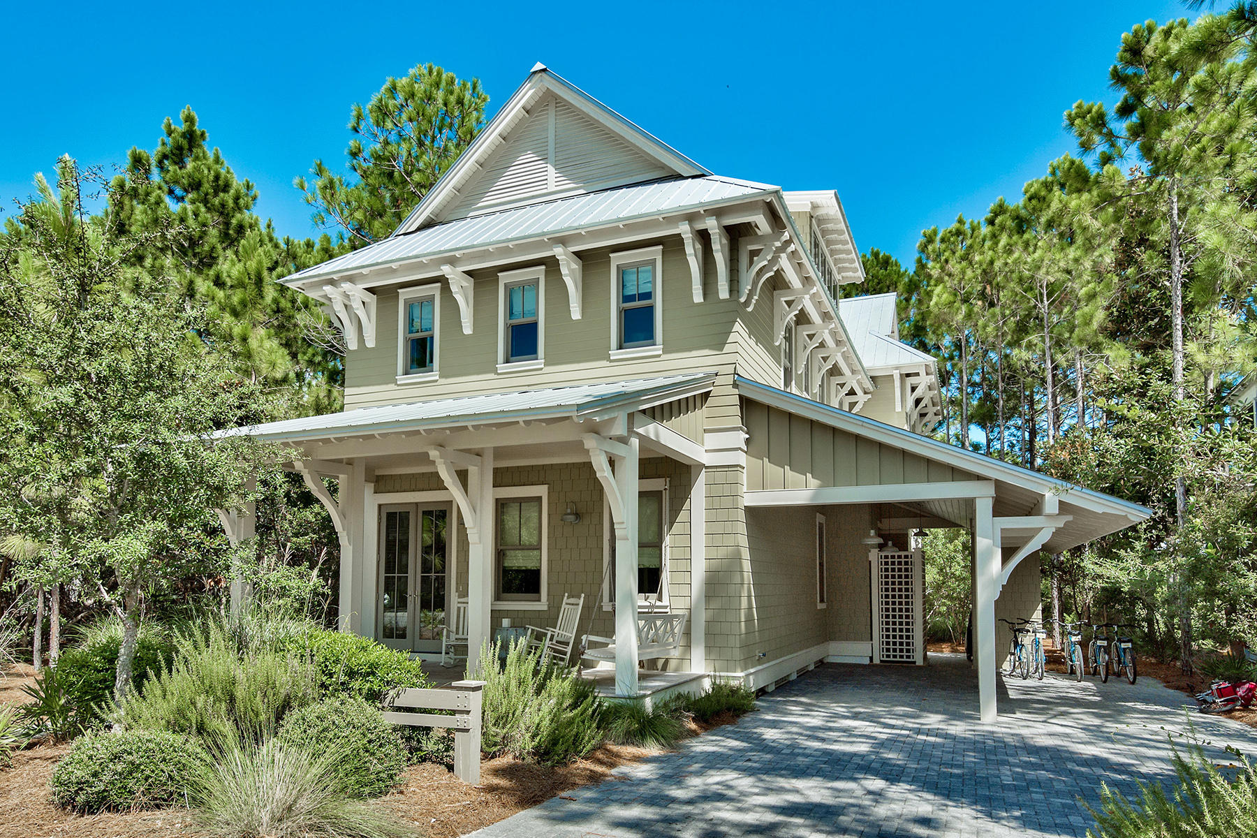 Custom built, 5 bedroom, 5 bath home in coveted WaterColor. This two and a half story property has been impeccably maintained and decorated in an upscale yet welcoming style from the relaxing front porch to the top of the line gourmet kitchen. The spacious floor plan includes high ceilings, walnut floors, wood planked walls, and an abundance of natural light. The main level boasts open living, dining and chef's kitchen which with gorgeous marble counters, professional style appliances and breakfast bar. Chances are, your favorite activity will be spending evenings in the oversized screened porch with fireplace which backs up to a peaceful nature preserve. This large lot also has room to add a swimming pool and outdoor entertaining space. The soothing second story master suite is the perfect place to relax and retreat to a private, screened-in porch unlike any outdoor space you have seen that includes a sitting area and large sleeping swing. The spacious guestrooms include a third story bunk room and play area, ideal for guests or sleepovers. Enjoy all the amenities that come with being a WaterColor homeowner, such as the renowned Beach Club, spa, tennis and fitness center plus miles of walking and biking trials. Kayak, Paddle Board or canoe on Western Lake or enjoy the beautiful nearby beaches.  This home is a must see.