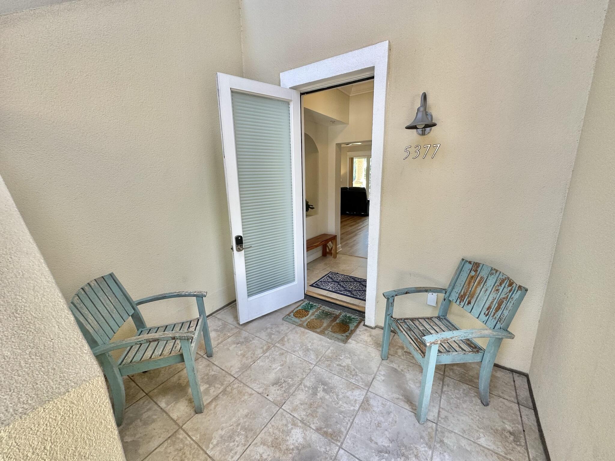 Finally! A one-story, walk-in level, 3-bedroom, 3-bath home on the beach side of Sandestin with a garage--absolutely perfect! High-end LVP floors brighten the living area, along with a wall of windows and an open floor plan. The full-width balcony overlooks both the golf course and the lake, offering stunning views. The kitchen features granite countertops and a bar that opens to the living and dining areas. There's also a separate laundry room with a full-size washer and dryer, plus extra cabinet storage. The master bedroom boasts a walk-in closet, gorgeous views, and a spacious private bathroom with dual sinks topped with tumbled marble, a whirlpool tub, and a separate glass shower. And yes--a golf cart is included! Come see it today!