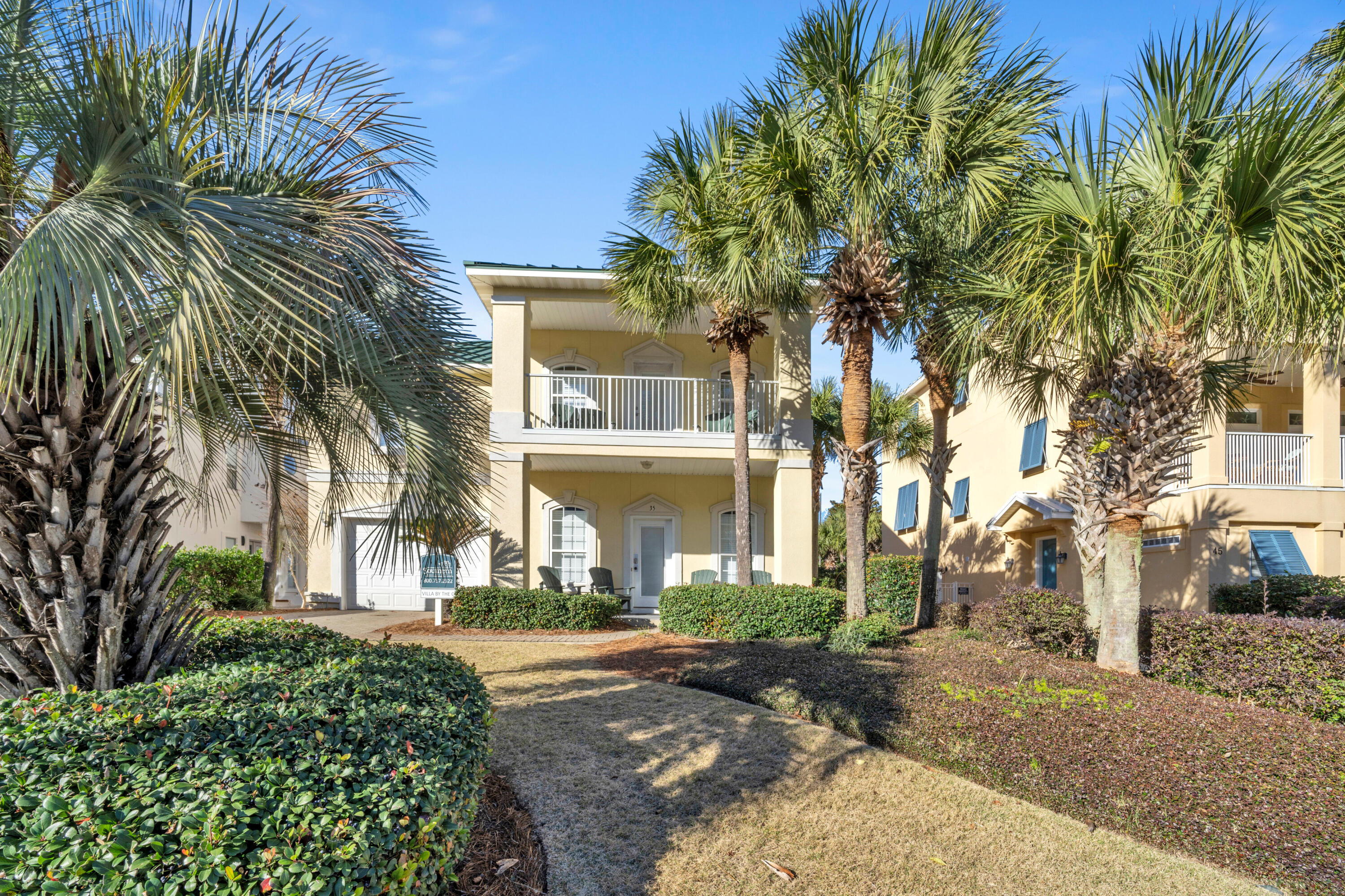 Home is with rental company but owner reserves holidays and family/friends most of the time. Rental projection 100-140K .A home that has room for everyone. 7 Bedrooms & one on every floor with two separate kitchens. Home is freshly painted, new bathrooms from vanities, commodes and showers along with a new second floor kitchen quartz countertop, Two laundry centers on the first floor.  Patios on all levels. Gulf views from multiple areas.  The complex is gated with one of the largest deeded beach area at 565 feet.  Gulf front pool. Interior complex has a heated pool, Hot tub Tennis, exercise room and club room.  Home is two lots to the beach access.  Open large rooms on all three levels.  Not far at all to shopping, restaurants and entertainment