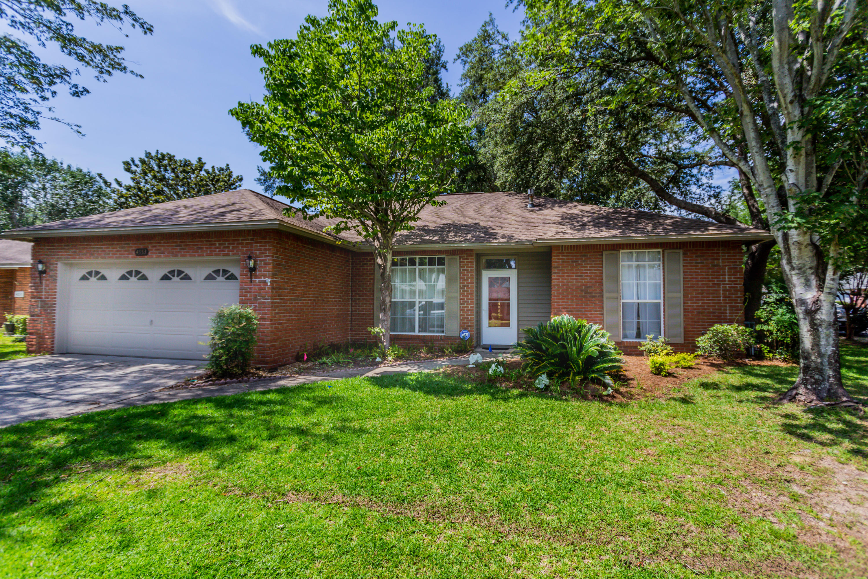 Absolutely the perfect layout, you will love this 3 bedroom, 2 bathroom split floor plan with an office! This brick ranch home is nestled in the heart of Bluewater Bay on a cul de sac perfect for outdoor entertaining and play!
When you enter the home you will be greeted by a vaulted ceiling, neutral paint color, vinyl flooring and ample natural light. There is a private office off the front of the home and two bedrooms tucked away off the living room.
The kitchen has been updated with white cabinets, quartz counters, a great moveable prep island, all new backsplash, new cabinet hardware and newer appliances.
The living room has a vaulted ceiling, wonderful corner fireplace and doors which leads to an awesome enclosed tiled Florida room which is 139 square feet of additional living! The Florida room is NOT accounted for in the square footage. The backyard is fenced-in with has mature trees making a great space for relaxing or for play!

Just off the kitchen is the large master bedroom, separate from the 2 additional bedrooms but not too far away. This space has a wonderful walk-in closet and private en suite bathroom with tiled walk-in shower and upgraded vanity. 

The two additional bedrooms are spacious in size with good sized closets. They share an updated hall bathroom with tub/shower surround, elongated toilet and vanity. 

This home is located on a corner lot with 2 car garage and parking out front which makes this home perfect for many folks!