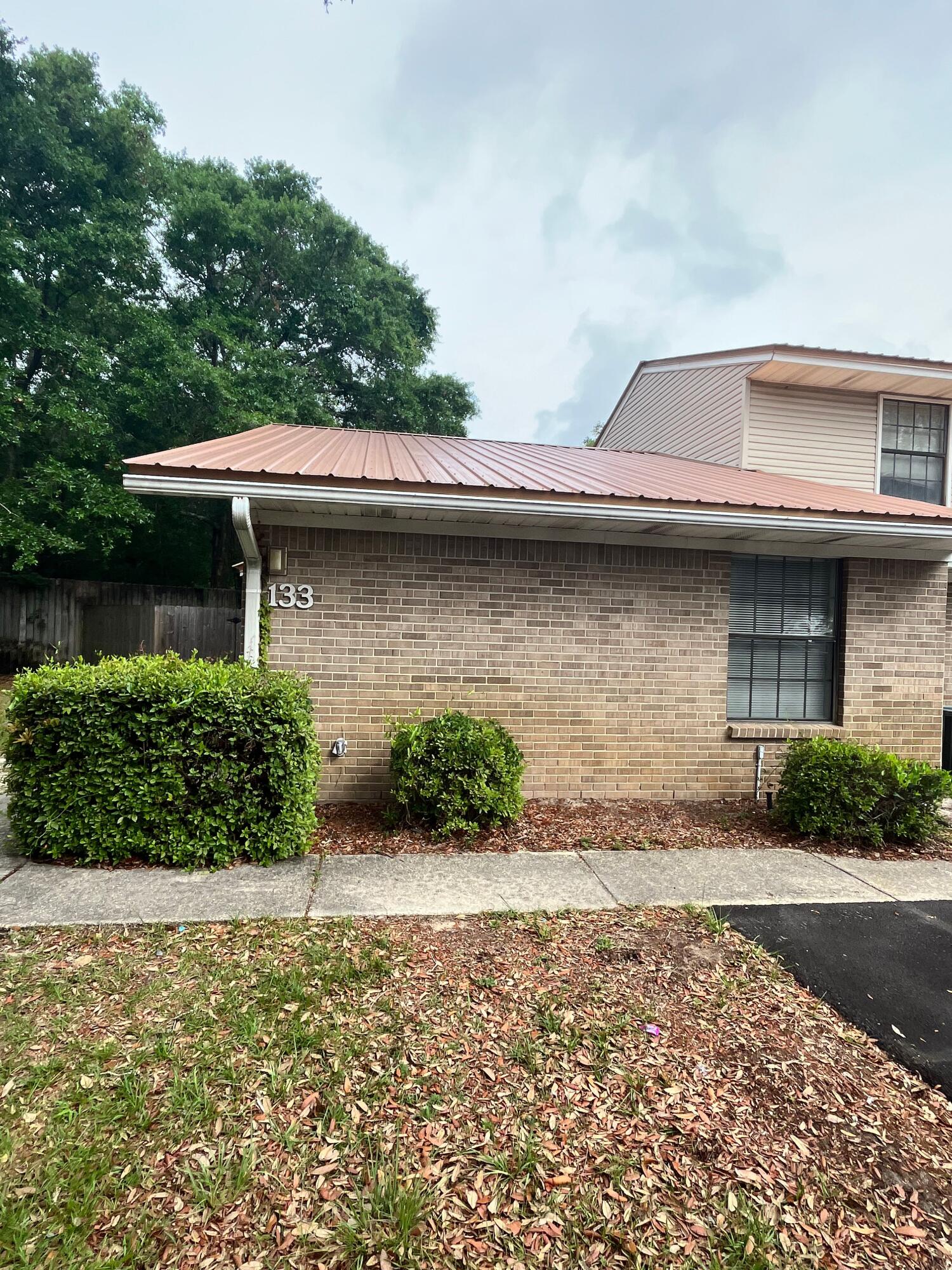 Spacious two story townhouse, breakfast bar, utility room, washer & dryer hookup, living room/dining room combo, private fenced back yard. No pets allowed.