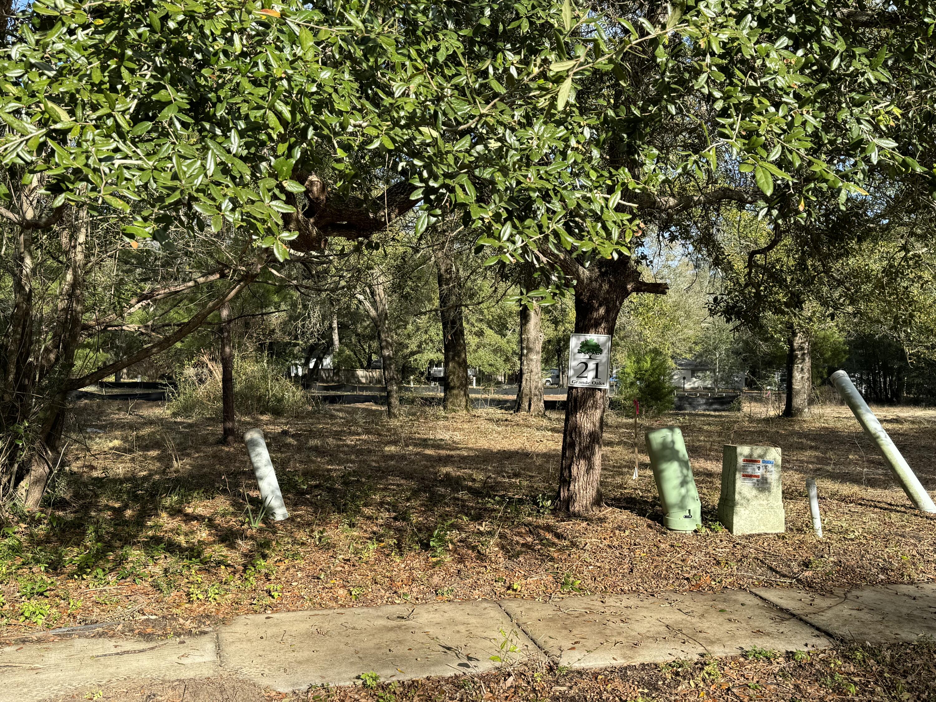 Looking to build a home?  Here is a beautifully wooded lot located in the heart of Freeport. This serene community only allows for single family homes.  This lot comes complete with city water/sewer taps paid. No fill dirt and land clearing needed. (Value $18,500). 

High-dry lot (Flood Zone X.) is ready to build your dream home, meaning you won't need to pay for costly flood insurance. No mobile homes allowed. Minimal restrictions and HOA is only $75.00 a month.

Great fishing on Four Mile Creek, or cruising onto the Choctawhatchee Bay or spending the day on White Sandy beaches of Florida's Emerald Gulf Coast. This amazing property is centrally located between Fort Walton Beach and Panama City Beach offering so much in the way of fun in the sun, tourism activities and Destin's World-Famous Crab Island all within a short 30-45 min drive. 

Information contained within this listing such as square footage, property measurements, etc are deemed to be accurate, but is not guaranteed. Buyer to verify.