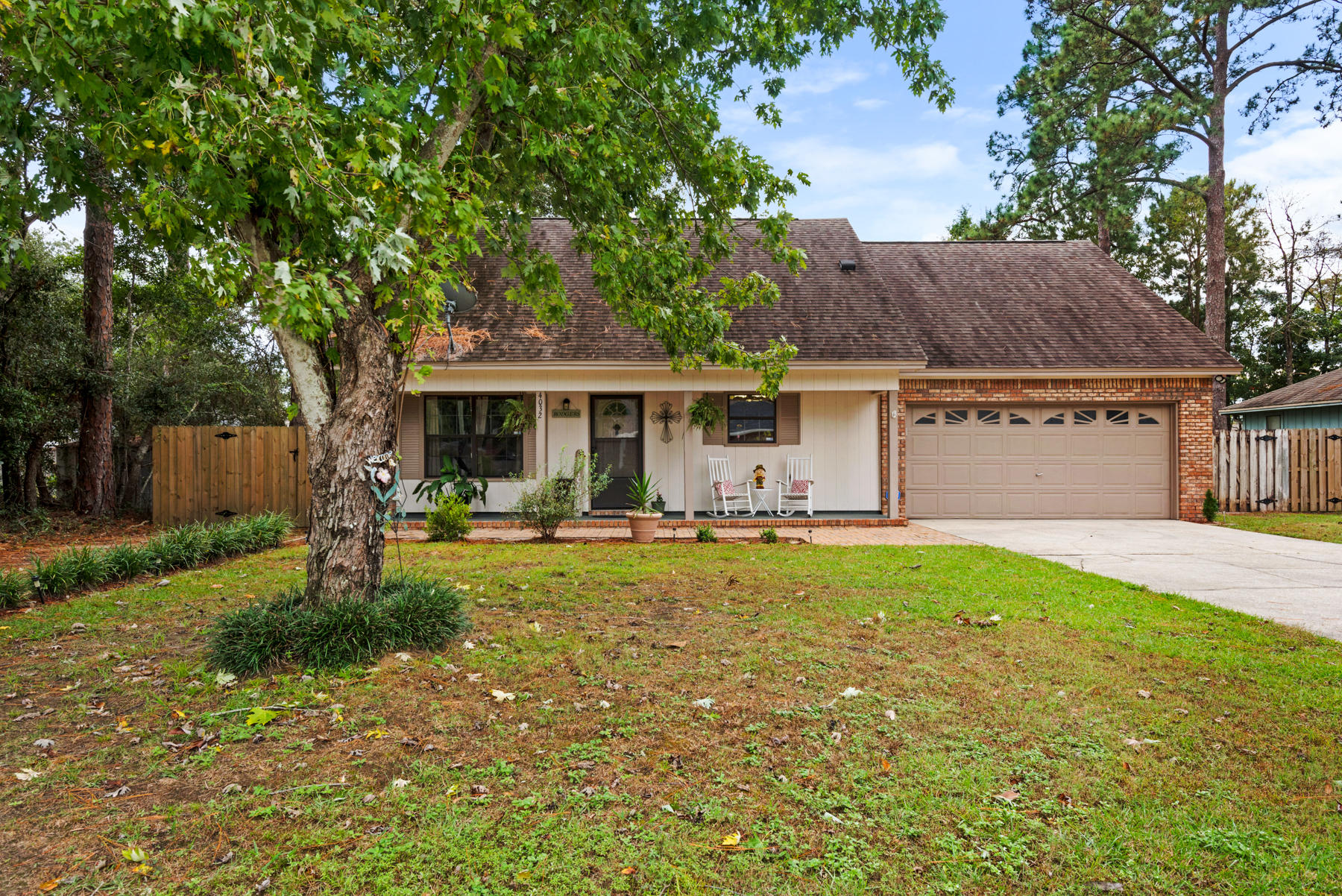 Looking for a 4 bedroom, centrally located home in Niceville? This one greets you with a nice open front porch and sits tucked back on .26 acres. Did I mention there is an in-ground pool? You enter this homes foyer and are greeted by its warmth. The main level is home to the eat-in kitchen, formal dining room, living area, two bedrooms, and a full sized bath. A large wood-burning fireplace is the living room's focal point. Upstairs is home to the master bedroom, full size bath and an additional bedroom. Interior flooring consists of laminate wood and tile so no carpeting to remove. Also lots of storage and countertop space in the kitchen. Home has been lovingly maintained by the sellers and is move-in ready for its new family. Large back yard features in-ground pool and large yard for entertaining and even has an outside shower to rinse off in. Home is covered by termite bond and is transferable. HVAC replaced in 2003. Roof replaced in 2011. Kitchen has updated cabinetry and newer appliances.