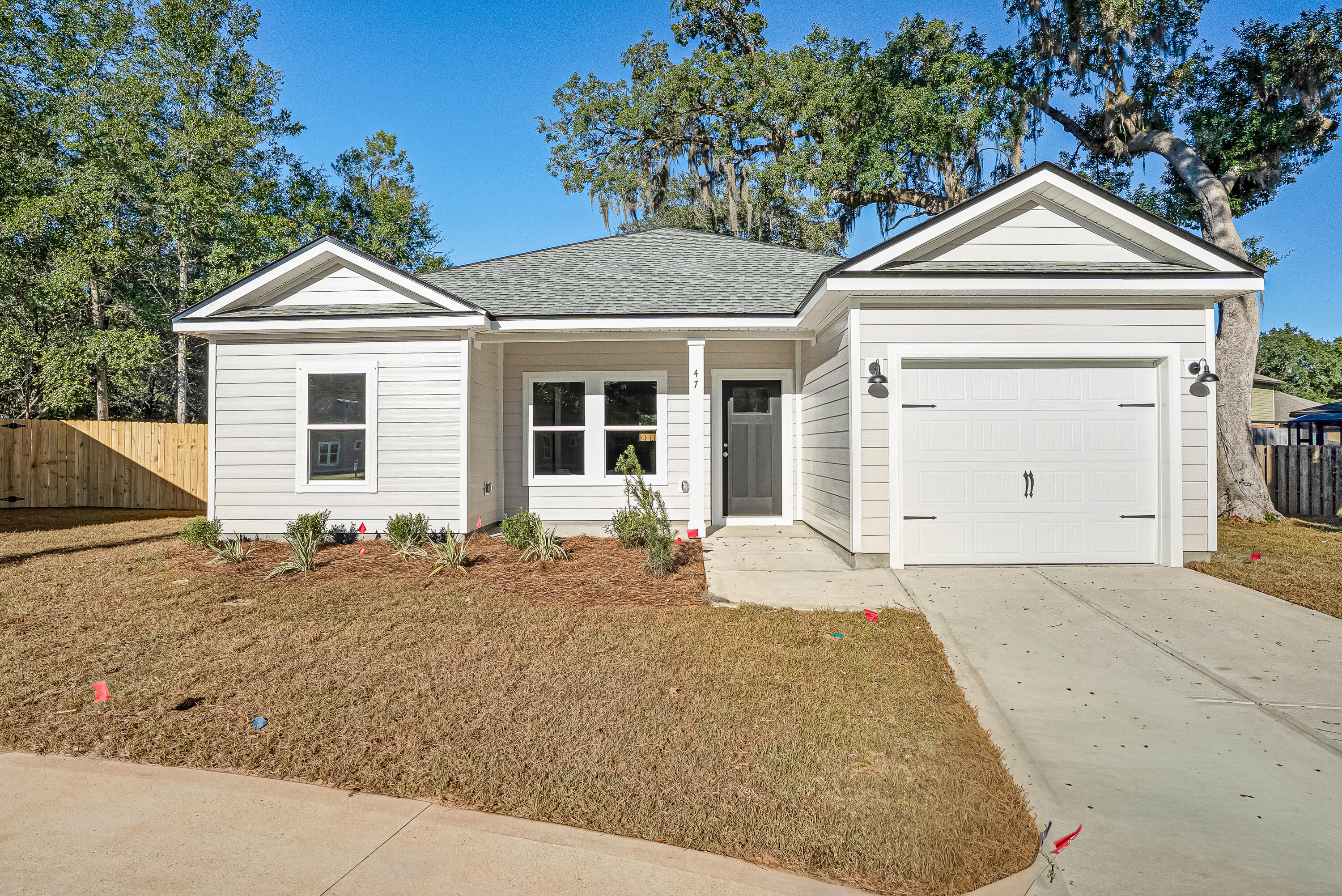 $13,000 TOWARDS BUYER CLOSING COSTS UNTIL FRIDAY THE 13TH!!  UNDER $300K - ALL HARDI COTTAGE WITH CUL-DE-SAC LOCATION - Relax on your front porch or enjoy the patio in privacy fenced rear yard.  Fully landscaped w/sprinkler system (HOA even cuts your grass). Split BR plan features double walk-in closets in owner's suite, bath has double vanities + linen storage, oversized mud/laundry room.  Raised ceiling family room w/recessed lighting opens to dining area & kitchen.  Work island has plenty of bar seating space, pantry and quartz countertops.  Late February completion.