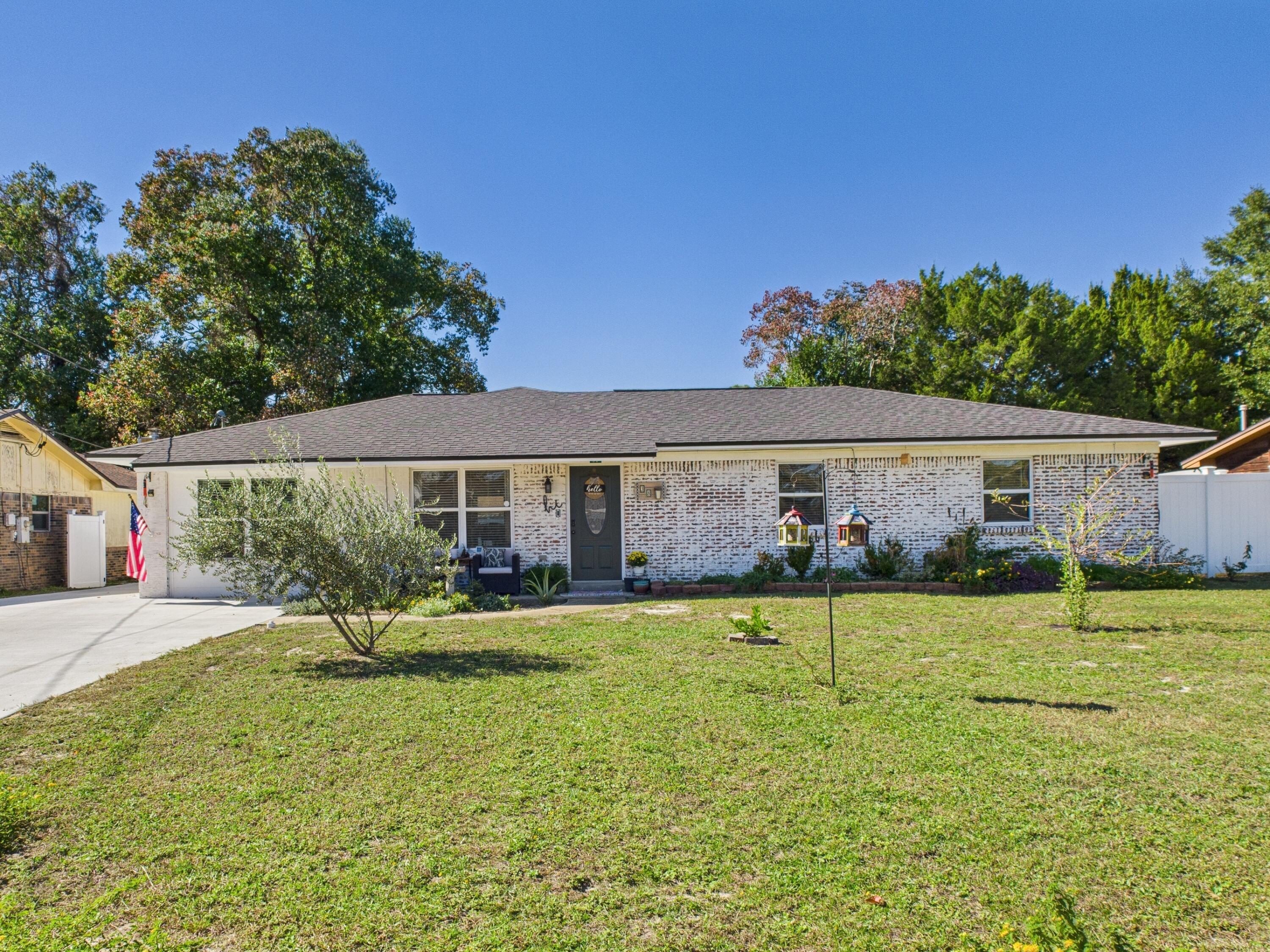 ***AVAILABLE January 1*** Completely renovated 4BR/3BA home in Fort Walton Beach offering 1,925 sq ft of single-story living. Features an open layout with a spacious living area, dining space, and modern kitchen with island, built-in storage, and stainless appliances. Primary suite includes double vanity, walk-in tiled shower with glass doors, and linen closet. Indoor laundry room with washer/dryer included. Detached garage in backyard for parking or storage. Conveniently located near Eglin AFB, Hurlburt Field, shopping, and dining. Pets considered with owner approval; deposits may vary. Deposit-free option available—move in without paying the full deposit upfront. Apply at myspenceproperties.com.