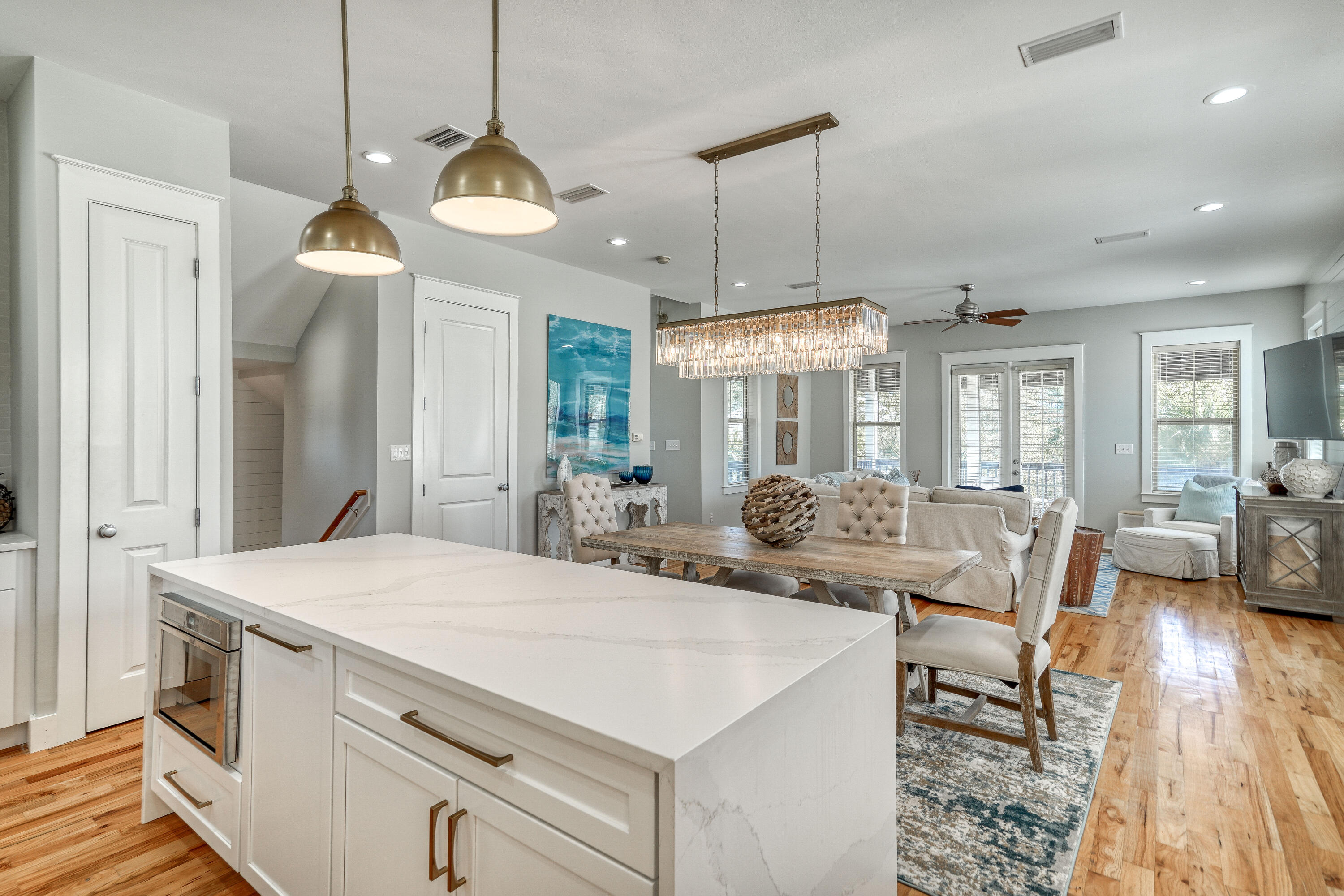 Beautifully updated 4 bed PLUS bunk room home SOUTH of 30A conveying with a GOLF CART and offering room for a private POOL! Thoughtfully designed featuring over 3,000 sq ft under roof and located in the quaint Cottages At Eastern Lake. This custom open concept home just received a new kitchen (new cabinets, Thermador appliances, quartz countertops, lighting, shiplap and hand cut Spanish tile back splash), fresh paint, all new bathrooms (tile, vanities, lighting, mirrors, showers, the works), new art, lighting and the addition of a bunk room sleeping 4. This 3 story residence was designed with space to add an elevator if desired.  Perfect as a vacation rental, 2nd home, or primary residence, close to the beach, south of 30A.  Rental ready, fully furnished and with a golf cart!