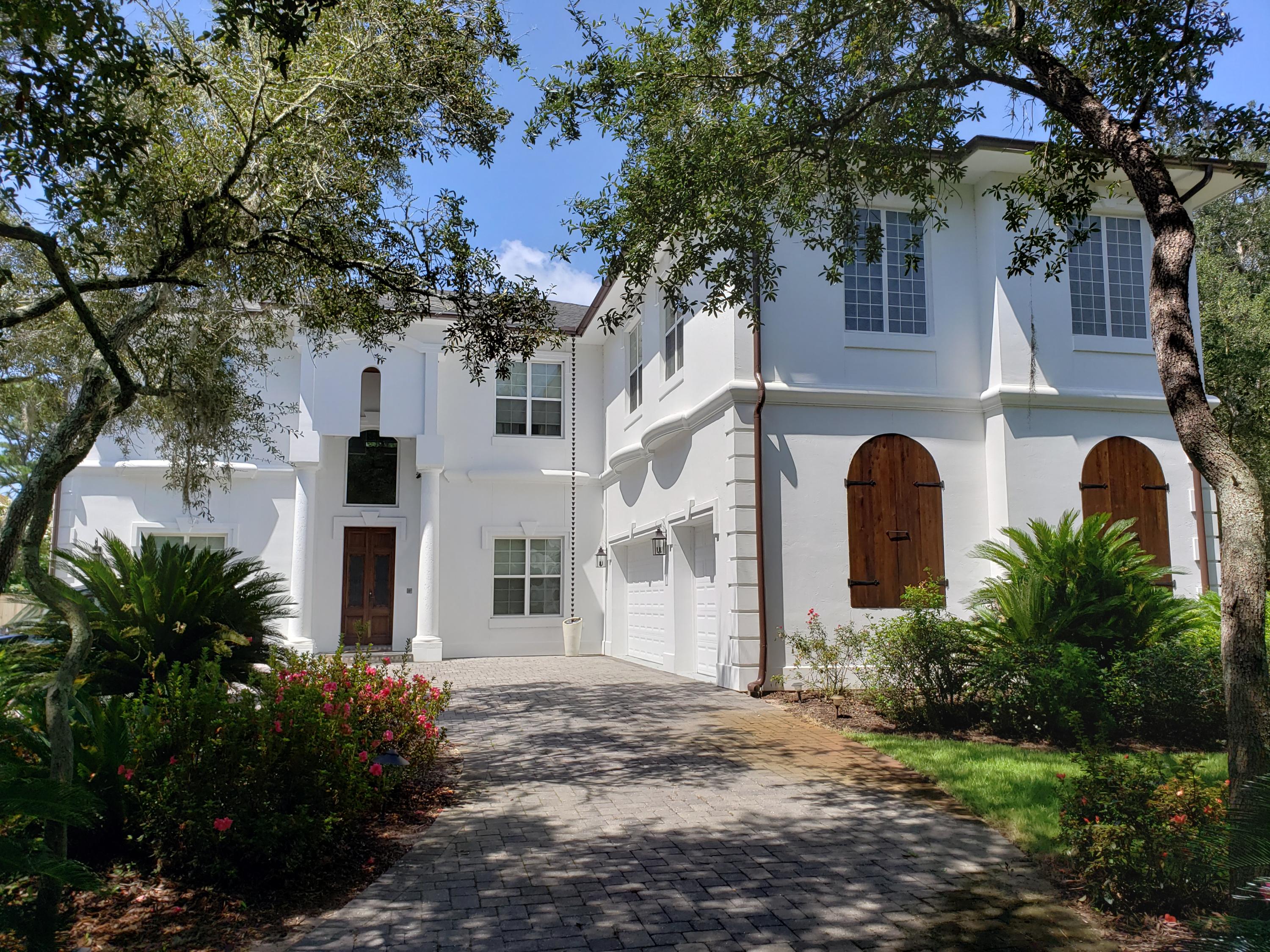 Refine Luxury throughout this 'ICF' Insulated Concrete Form home with its Structure, Incredible Design, and Exquisite Taste of furniture, artwork, and decor objects that WILL convey with purchase.  This expansive waterfront estate, 60' inside the canal with bay views while admiring its own 75' of water frontage. This ICF construction appraises 65% cost over the usual frame built home.  With its solid construction you'll not have normal home concerns. This home has been built with 12' ICF (Insulated Concrete Form) exterior walls, 14'gauge steel floor joists, steel stud interior walls (sound insulated), in addition (3) geothermal heating, air conditioning units, and (2) Rinnai hot water systems. ICF provides: 1. Lower energy bills 2. Greater comfort and quiet 3, Pest Proof 4 Healthier indoor 5. Safe haven withstanding wind speeds up to 250 mph from tornedos and hurricanes 6.Fire resistant... concrete is safer 7. Less repair and maintenance. Luxury begins when you walk through the entrance doors, imported from the French Quarter in New Orleans into the 24 ft atrium greeted by the grand Brazilian cherry wood staircase. Whether you're entering the dining room, the home office, its grand living room, family room or the Chef's kitchen with a large water front breakfast area IT'S STATEMENT is contemporary, refined luxury, sophisticated design yet instantly feels like home, comfort, family! The gourmet kitchen equipped with a large quartzite center island, 6 burner gas Wolfe oven, built-in Dacor microwave and convection oven with a warming drawer, Sub-Zero refrigerator and a Kitchen Aid ice maker. Just off the kitchen is a large laundry room, a home gym complete with cork flooring then exits to the oversized (3) vehicle garage and a temperature controlled workshop/storage room. The first level also offers direct access to the large brick-paver patio complete with a built-in gas fire-pit and grill, a covered boat lift for up to a 30' boat, two jet ski lifts and extended dock. If you desire more down time relax on the screened porch with soaring ceiling of gorgeous Brazilian planks, ceiling fans, unique arched windows with views of water front and back yard activities. The Second Floor begins with the Master Retreat, 3 additional bedrooms, 2 full bathrooms and a media room. Your Master Retreat is like none other from a sitting area with view of the bay, a huge balcony to lounge out on, elegant chandelier, a gas fireplace for that cozy feel that can be seen from the master bedroom and also in the master bathroom. The  master bathroom features a Jacuzzi tub, double sink vanities with makeup area, a double shower, a steam room and a bidet. The master closet is simply amazing from organized shelves, hanging areas, shoe departments, dressing area, mirrors, build-ins, a sitting area... it's huge and your dreams come true. This extraordinary compound is a true family retreat offering a waterfront lifestyle unlike any other in South Walton County with excellent proximity to world class shopping, dining, entertainment also boating access, fishing, and other fun watersports. NOTE: With the sleeping quarters being located on the second floor if in the future you desire an ELEVATOR this can be installed, there is a designated location for this addition. If you desire an inground pool Cox Pools has a designated area for this within the paver brick patio area. No reason to search further... Move in ready, this is your Home Sweet Home!!!!!
