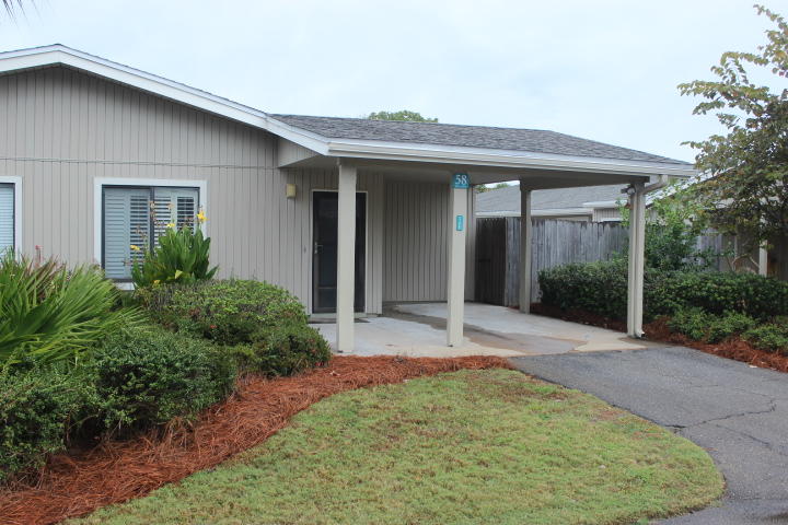 Seascape Tennis Villas. These units seldom come on the market.
This 2 bedroom, 2 bath condo in Seascapes Tennis Village would be the perfect residence or furnished rental investment! What an awesome location, close to tennis courts, beach access, golf courses and restaurants. The condo features tile flooring, an open living area, fenced patio area and a 1 car carport.