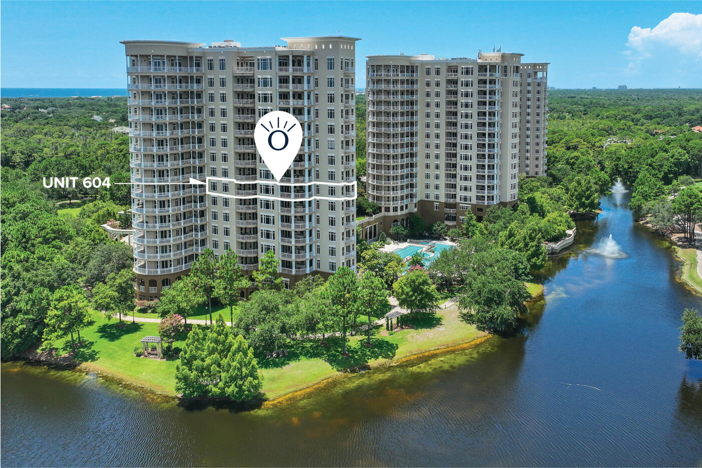 Welcome to Unit 604 at One Water Place - an exquisite Darlington, the most popular floor plan, offering 3 bedrooms, 3.5 bathrooms, and 3,415 square feet of refined living space. Perched on the 6th floor and boasting three private balconies - including one with a built-in summer kitchen - this residence showcases sweeping views of the Choctawhatchee Bay and the lush fairways of Kelly Plantation. Enjoy waking up to spectacular sunrises from any of the three balconies while you sip your coffee an take in the breath taking views of the Bay. From the moment the elevator opens into your private vestibule, you'll sense the thoughtful design and upscale touches that set this home apart. Inside, coffered ceilings, custom millwork, and elegant crown molding create an atmosphere of timeless.... sophistication, while wide-plank wood floors run seamlessly throughout the open living areas. The light-filled great room, anchored by a gas fireplace and flanked by built-in bookcases, flows effortlessly into a formal dining space and a cozy sitting areaperfect for entertaining or unwinding in style. Adjacent to the dining room is a climate-controlled space that can serve as a wine cellar or butler's pantry for entertaining. The fully renovated kitchen is a chef's dream. Outfitted with top-of-the-line Viking appliances and a very quiet Bosch dishwasher and highlighted by quartz countertops, a custom tile backsplash, and a custom pantry, it balances beauty with function. Pendant lights over the counters add visual warmth, and the breakfast nook offers a relaxed spot for casual meals. The owner has thoughtfully added a whole-house water filtration system, filtering out chemicals for healthier cooking, bathing, and laundering. All windows and doors have been professionally sealed recently, resulting in remarkably low utility costs and a tranquil, energy-efficient environment. Every bathroom in the home has been fully renovated, with the master suite standing out as a serene retreat. The spa-like master bath features a freestanding soaking tub, a custom walk-in shower, and custom shelving and cabinetry, which discreetly houses a beverage cooler and hidden safe. The suite opens to its own private terraceperfect for morning coffee with a view of the Bay and Golf Course. The split-bedroom layout ensures privacy for all, with two spacious guest suites each offering their own en-suite bathrooms. The laundry room is equally well-equipped, with a built-in wall-mount ironing board and additional storage space. This condo not only has two secured parking spaces, they're intentionally positioned on the 1st floor near both the elevator and car wash, vacuum, and air station and afford easy ingress and egress even for large trucks or SUVs. One Water Place offers a resort lifestyle with unmatched amenities: a grand clubhouse, full-service Wellness Center with a steam room, dry sauna and a Juice Bar, in addition to a 5,000-square-foot fitness facility, a resort-style pool with waterfalls and both indoor and outdoor hot tubs, movie theater, game room, library, and lighted tennis, bocce, and pickleball courts. Walking trails, Riding Stables, a dog park, a putting green, and the Fred Couples Signature Golf Course round out the offerings in the vibrant Kelly Plantation community. Kelly Plantation is just minutes from the Destin Executive Airport and the Destin-Ft. Walton Beach Airport and there are four grocery stores; along with Lowes and Home Depot all within one mile. Kelly Plantation is less than a mile from the Henderson State Park and its more than 6,500 feet of pristine shoreline. Henderson State Park is an approximately 200 acre parcel, renowned for having some of the whitest sand beaches in the World. For those seeking luxury, convenience, comfort, and a resort lifestyle in one of Destin's most prestigious addresses, 604 One Water Place delivers on every level.