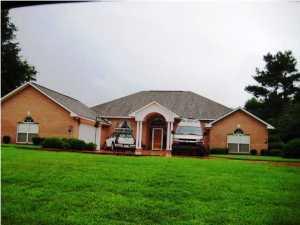 Vacant. Good condition. Painted and cleaned. Pristine manicured corner lot in upscale Stonebrook subdivision just one block from the Stonebrook Golf Course and Clubhouse. View of #9 Green and #10 Fairway. Your entrance features a circular drive graced with a large fountain cascading into a flower-rock garden. The homes features a gracious entry foyer opening to your formal dining room on one side and formal living room on the other. Continue on to the large great room with gas fireplace. The warm kitchen features; and dining area are made for comfort and ease with a view of the great room. Amenities include beautiful maple cabinets, smooth top stove, self cleaning oven, microwave and pull outs for kitchen ware and deep drawers for pots and pans. A large master bedroom with
