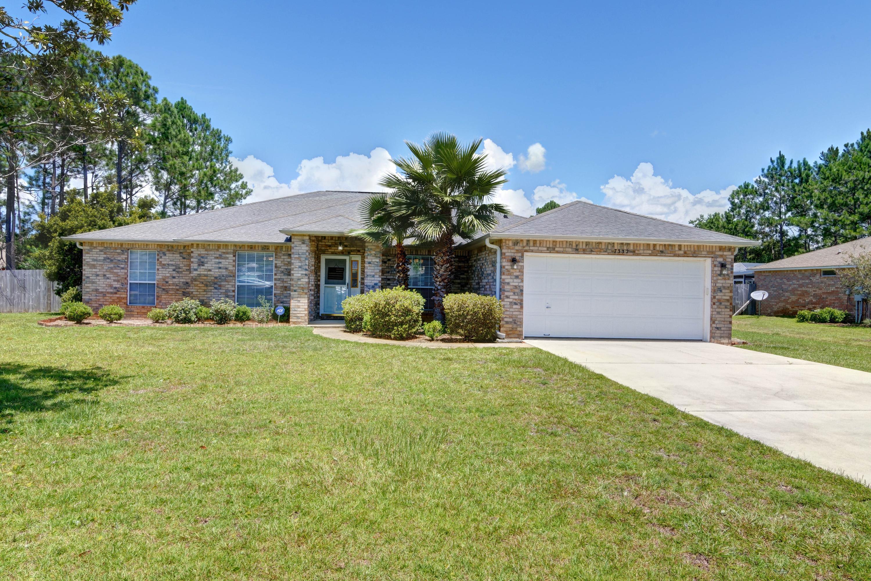 Situated in a fantastic area of Holley by the Sea (with underground utilities and public sewer - no septic tank!), this all brick 4BR/3BA split bedroom updated home features a fantastic floor plan in 2,643sqft with several bonus living spaces! Walk in the front door and you'll love the formal dining room and office/flex room on either side, and keep walking into the large family room with a cathedral ceiling. No popcorn ceilings here, they have all been removed! The fully renovated kitchen is a dream and features custom cabinetry, granite countertops, backsplash, stainless appliances, pendant lighting, and a custom functional center island. Looking for more versatile space? The oversized interior sunroom is perfect - especially if you need a home/virtual school room space! The spacious  owner's suite has updated cabinetry and granite counters, and you can be sure to relax in the separate garden tub or walk in shower. Don't miss the private water closet and the extremely nice sized dual owner's closets! This floor plan is a can't miss with a separate bedroom and bathroom on the other side of the house perfect for an in law or older child, and the other two bedrooms share a bathroom on the front side of the house. The interior laundry room leads to the two car garage, and outside enjoy the almost half acre fenced in backyard with an enormous concrete patio and outdoor storage building and irrigation system. Ownership includes exclusive membership to Holley by the Sea's multi-million dollar 45 acre recreational center with 8 tennis courts, 3 swimming pools, beach house, full gym, aerobics, summer camp, lighted basketball courts, handball & racquetball , co-ed sauna & steam room, playground game room, daily & weekly events and much more! Don't delay in securing your new home!