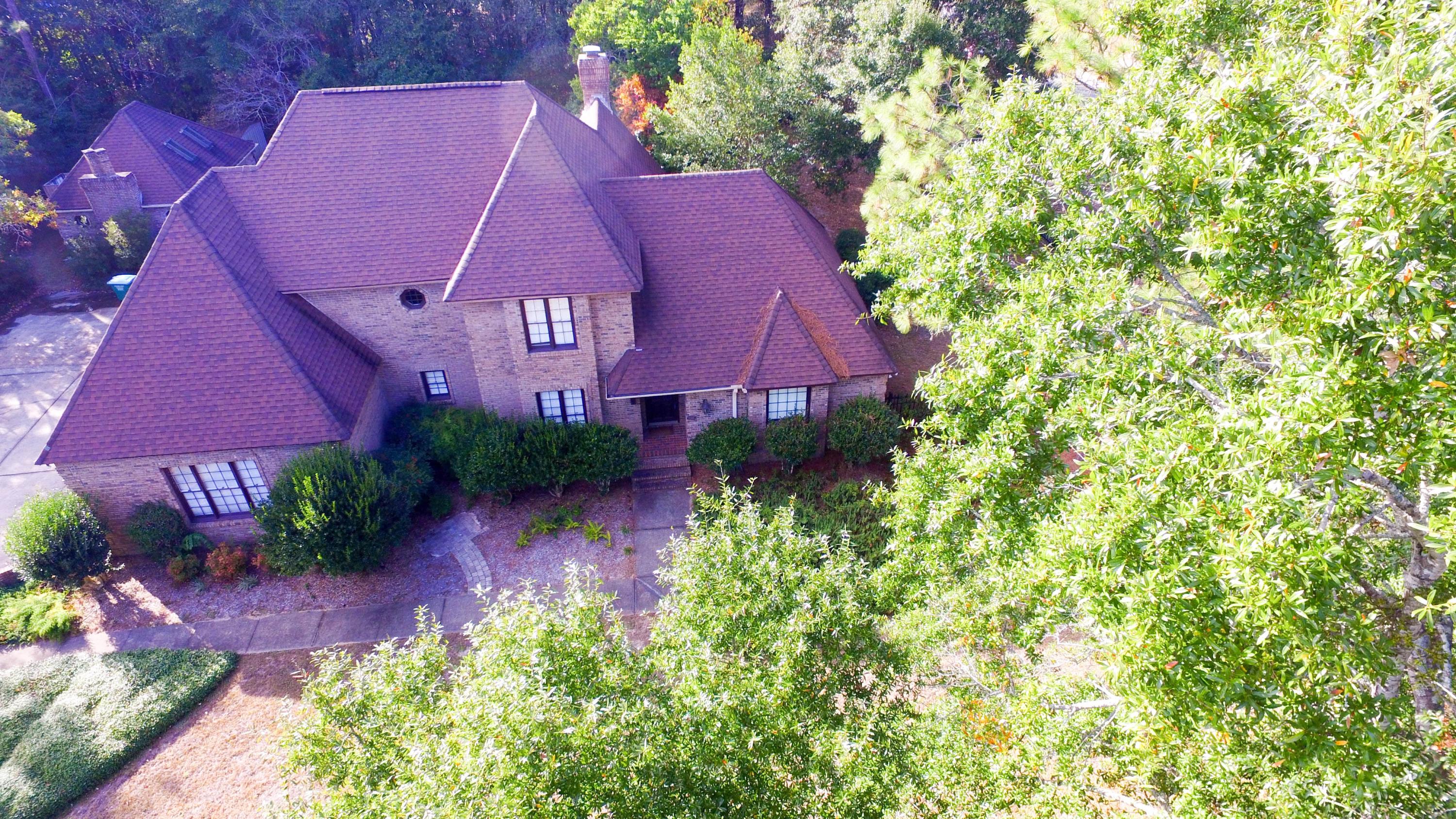 Updated executive home on acre lot boasts long list of amenities, including custom kitchen, tile & granite. Master suite has fireplace, large closet w/built-in shelves.Second floor has 3 bedrooms & 2 baths. There is also a separate guest house that is an additional 437 sq ft. Screened in Lanai overlooks solar heated pool. Beautifully landscaped yard in quiet, established community makes this home a must see. Pool maintenance and Yard care is included in the rental price.