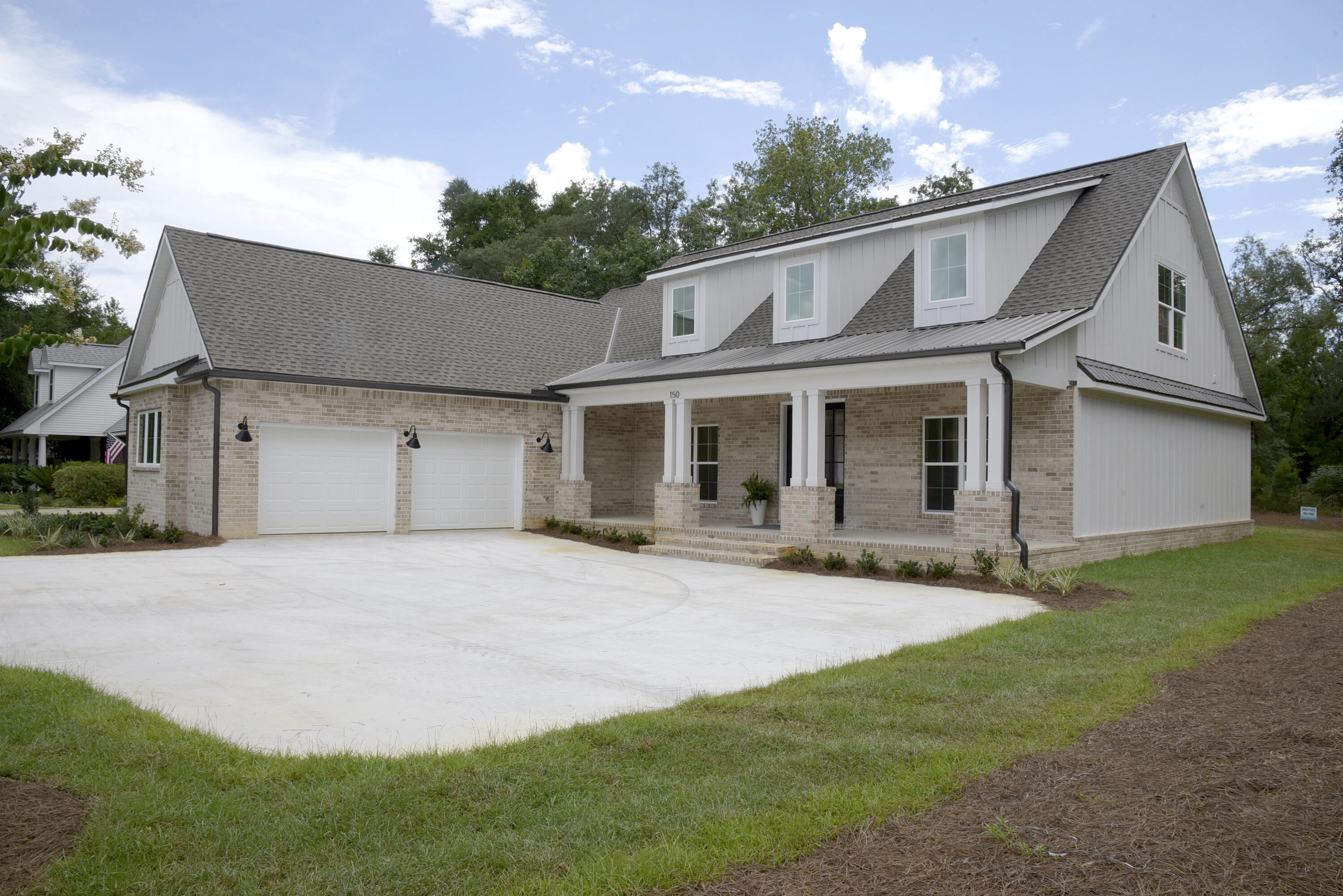 Stunning Southern style home will welcome you with all the top shelf custom features you desire. Starting with the large front porch just waiting for a pair of comfortable rocking chairs, you will love the the open floorpan with room for everyone! Grand living room offers beautiful built-ins and cozy fireplace. Gourmet kitchen features stunning white shaker cabinets, quartz countertops, stainless appliances (ice maker not warranted), apron sink and an abundance of counter space. Desirable first floor master includes a luxury master bath with soaking tub and beautiful custom shower.  Upstairs you will find a spacious bedrooms and full bath. There is even a bonus/office/playroom. Home offers premium vinyl floors on the main floor and plush carpeting upstairs. Two HVAC units will keep both downstairs and upstairs cool and comfortable year round. Enjoy sitting on the covered back porch and listening to the birds in the tranquil backyard. Community boat launch is just 3miles away. This home offers the best of both worlds, country living yet close to city amenities. Sorry, NO pets and NO smoking. Any person 18 years old or older must apply separately. Tenants required to carry renter's liability insurance.