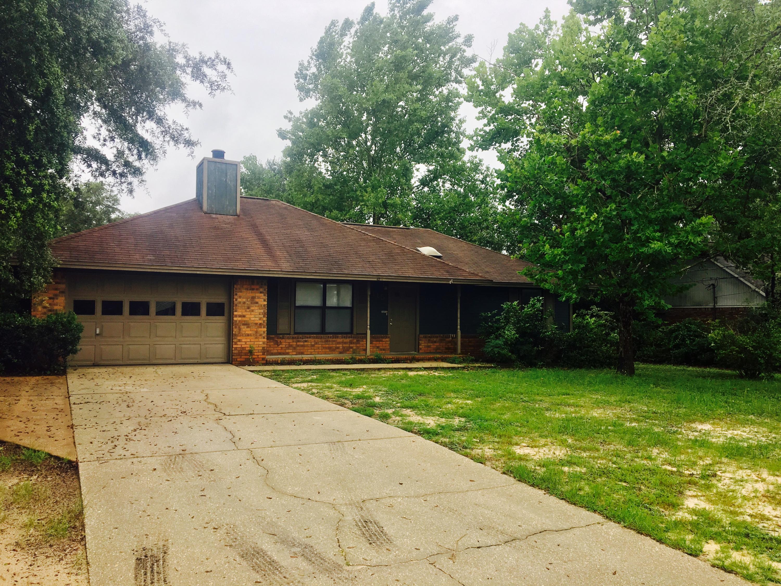 Excellent and affordable location of Crestview. This adorable home has the features anyone would require in a home: an oversized one car garage, large screened porch, open deck for entertaining, 3 bedrooms and 2 full baths, walk-in closets, wood burning fireplace, large tiled kitchen with pantry, a wonderful fenced in back yard and much more! No Pets allowed.