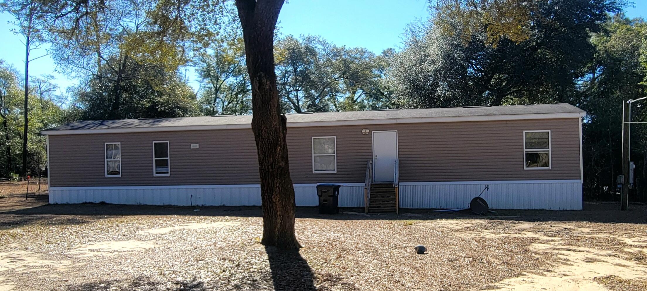 Affordable living in this 2016 single wide mobile home on appx. 1/2 acre in the heart of Mossy Head.  Nice clear front and backyard for kids to play.  Easy to view.
