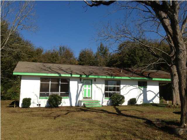 You will find country living with all the conveniences of the city near by. This is a 2 Bdrm/1 Bath home that sits on a nice and quite 1.66 acres. Home will be freshly painted