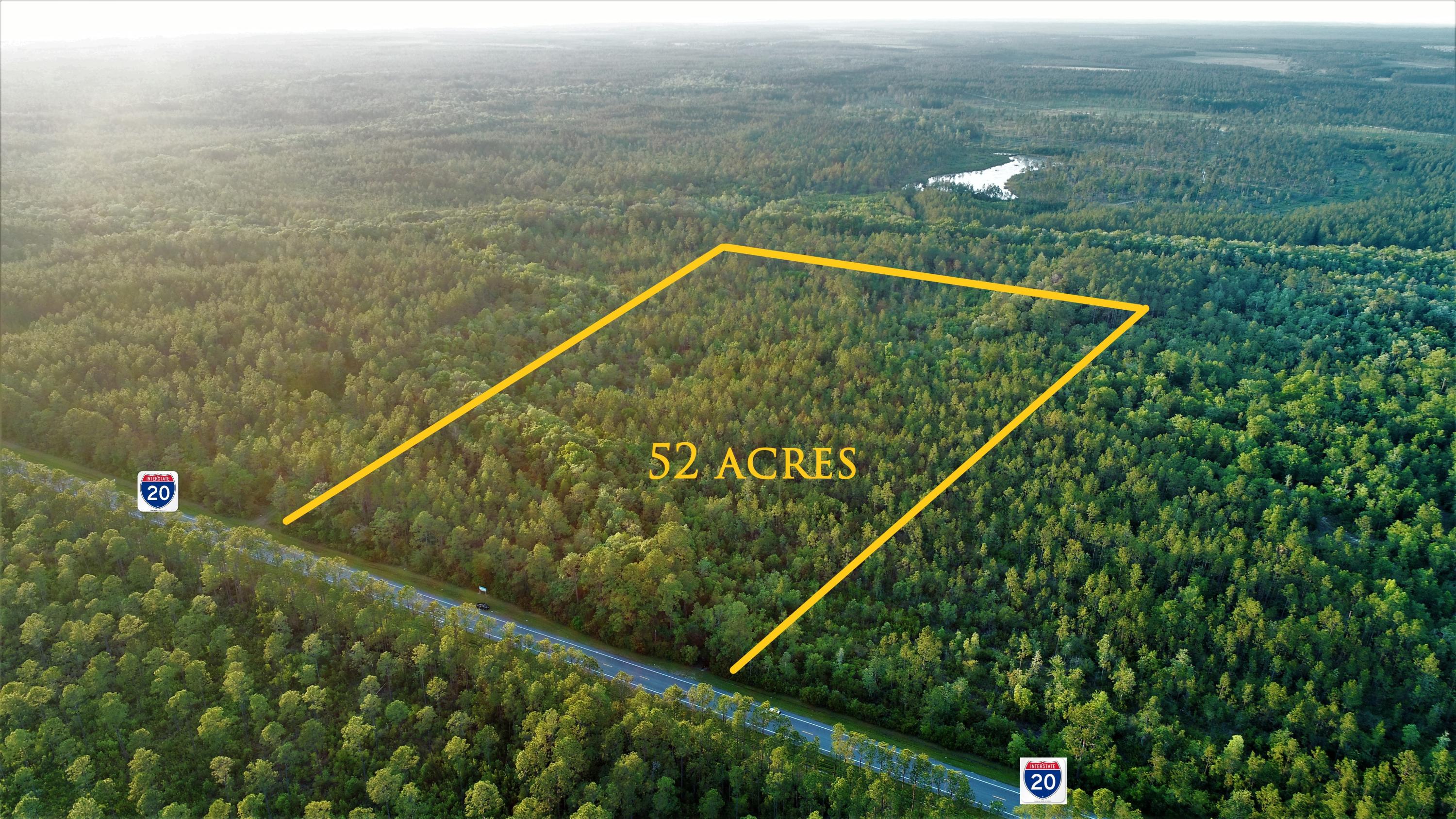 Great parcel of 52 + acres in Walton county/Freeport, FL right off of busy Hwy 20. Plenty of opportunities with this prime land. Build a spacious home only 5 minutes from the beautiful Vortex Springs and very close proximity to the beaches of South Walton. Also a 10 minute drive to Publix in Freeport, and 25 minute drive to Northwest Florida Beaches International Airport. This also could be a great investment for a investor looking to build.