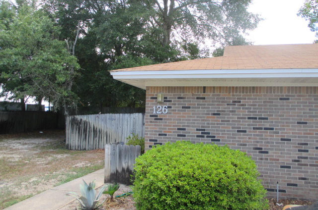 Just updated! New cabinets and counters in the kitchen along with a new fridge. New flooring throughout - carpet in bedrooms and tile in living spaces. Kitchen Giant privacy fenced yard with shade tree, patio, and outside storage. Fresh paint completes this unit and it's ready for move in! No smoking and no pets. $15 Waste Management fee per month to be added to rent amount.