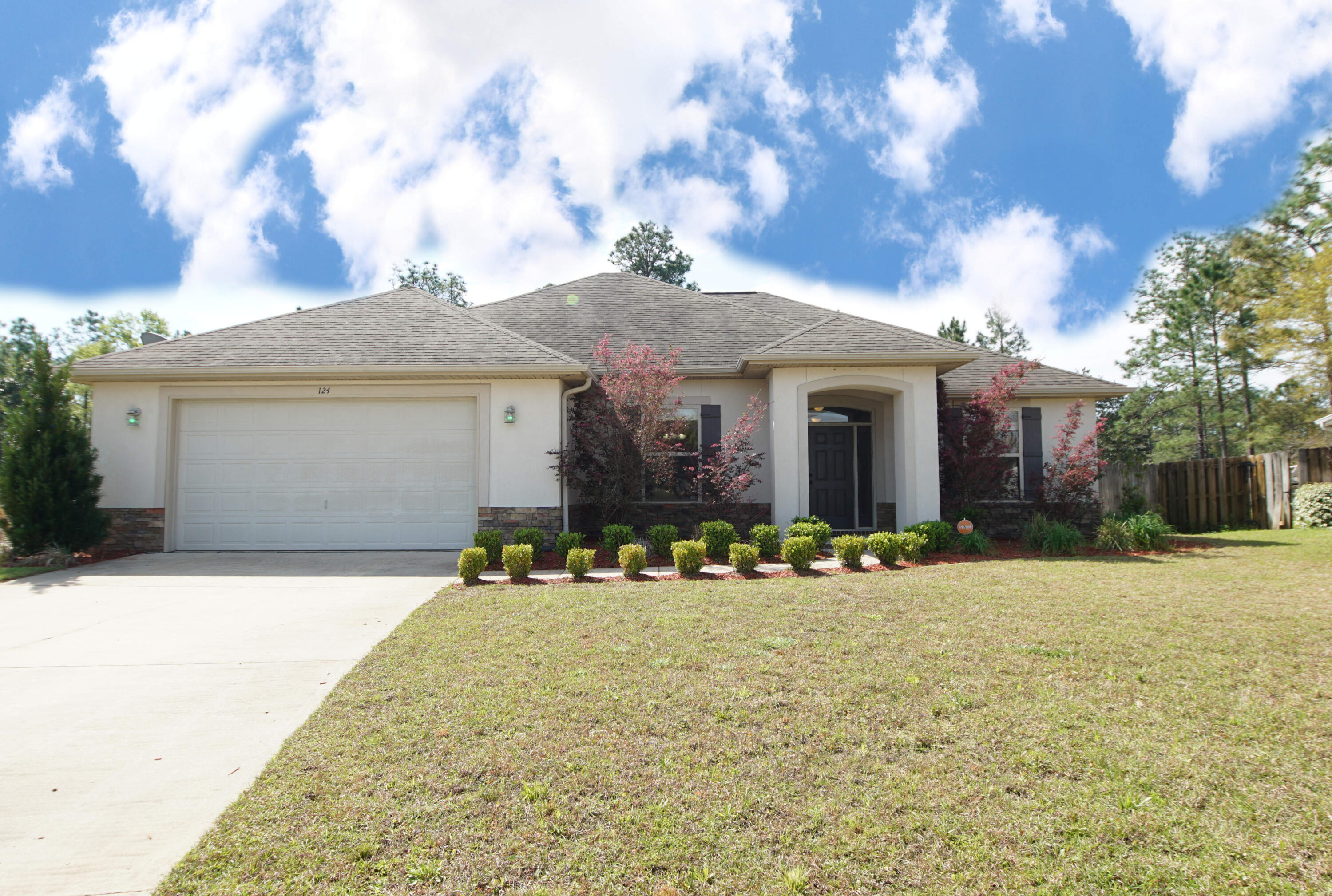 This home checks all the boxes! Quality construction, SOLAR PANELS, located South of I 1-10 and well maintained. Spacious living area open to kitchen and dining. Living area has French doors that lead to a covered back porch. Kitchen sports granite countertops, stainless steel appliances and breakfast bar. Split floor puts the living area between the primary bedroom and the two additional bedrooms. A pocket door separates the additional bedroom wing from living area allowing for added privacy and noise control. Oversized garage, large laundry, and plenty of closets for storage. Large backyard with privacy fence. Convenient location to Duke, 7th Group, Eglin, EOD range. Pets may be allowed with owner approval and a non refundable pet fee. Applications on www.nicevillerentals.com