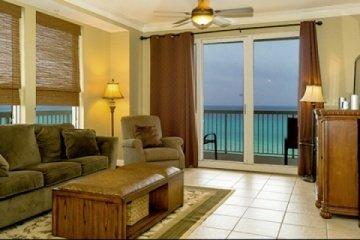 Welcome to Seychelles located close to St. Andrews State Park and just next door to famous Schooner's. This fully furnished 3 bedroom, 2 bath condo offers 1,425 sq ft of comfortable living area and a long wall of windows great natural light. The spacious kitchen offers stainless steel appliances and a large breakfast bar. The master bedroom has balcony access and has a large bathroom with separate garden tub and shower. The 2 guest bedrooms are at the front unit and offer sleeping space for a total of 9. Condo has a large in-unit storage closet. Seychelles offers two Gulf front pools with hot tubs, fitness center, conference room, onsite rentals & association management, covered parking plus 200' of beach. ALL utilities are included in dues, even power. Taxes for 2015 are $4109.